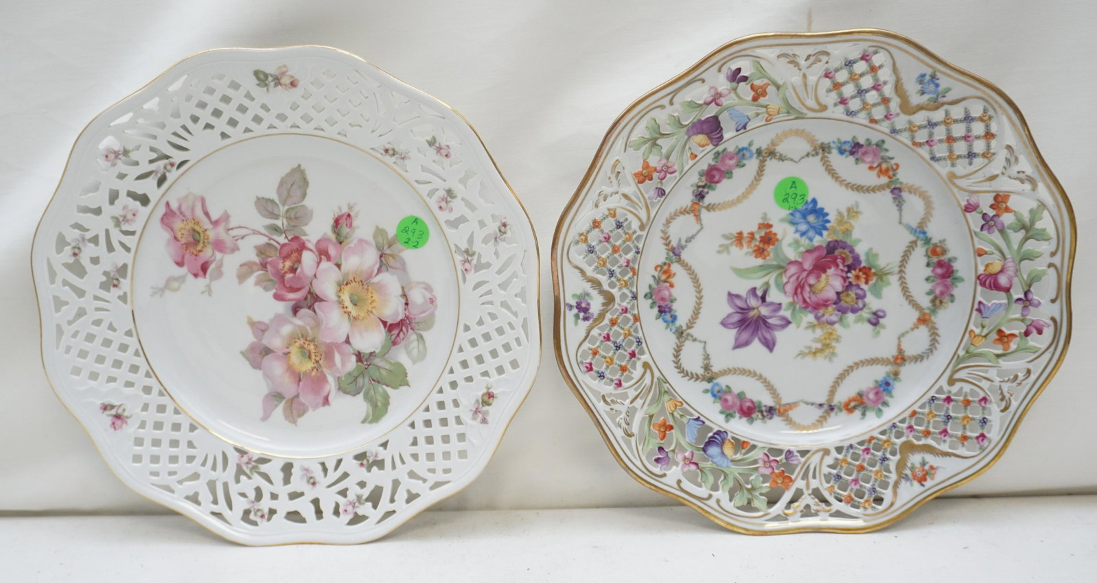 2 SCHUMANN GERMAN CAKE PLATES: 2 Vintage German Schumann Porcelain Cake Plates. Both with florals and reticulated rims. Each 11". Weight 2 pds 10 oz. PROVENANCE: Edwin Moore Brogdon, PhD, collection. Dr. Brogdon was the owner of Br
