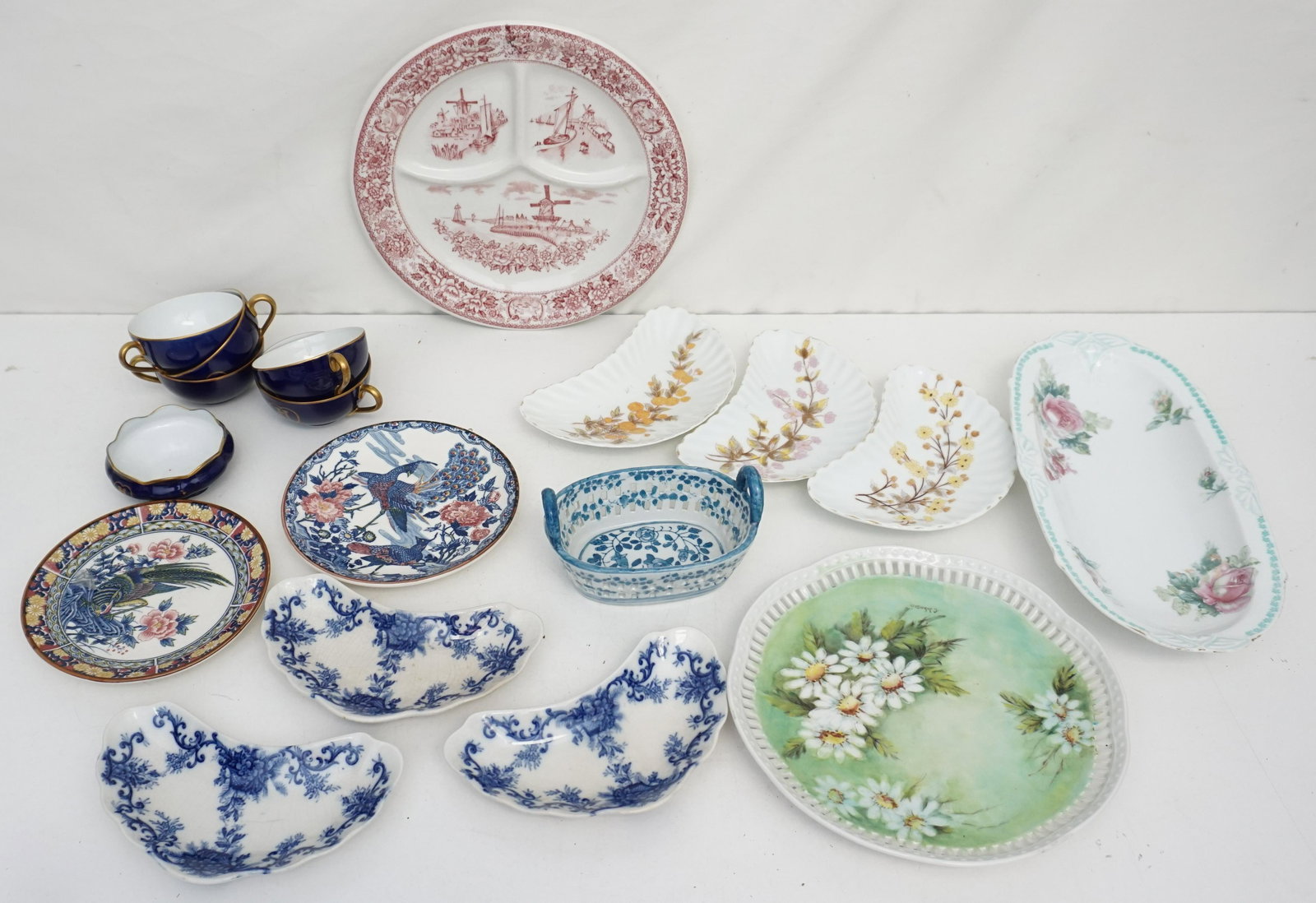 19 pc ANTIQUE & VINTAGE PORCELAIN LOT: All are Antique / Vintage.1- German Porcelain Celery Dish Roses 11 3/4". 2- Hand Painted Daisies Plate, reticulated rim 8 1/4". 4- Pair Japanese Peacock and Pheasant Plates 5 3/4". 5- McNicol Red Tran