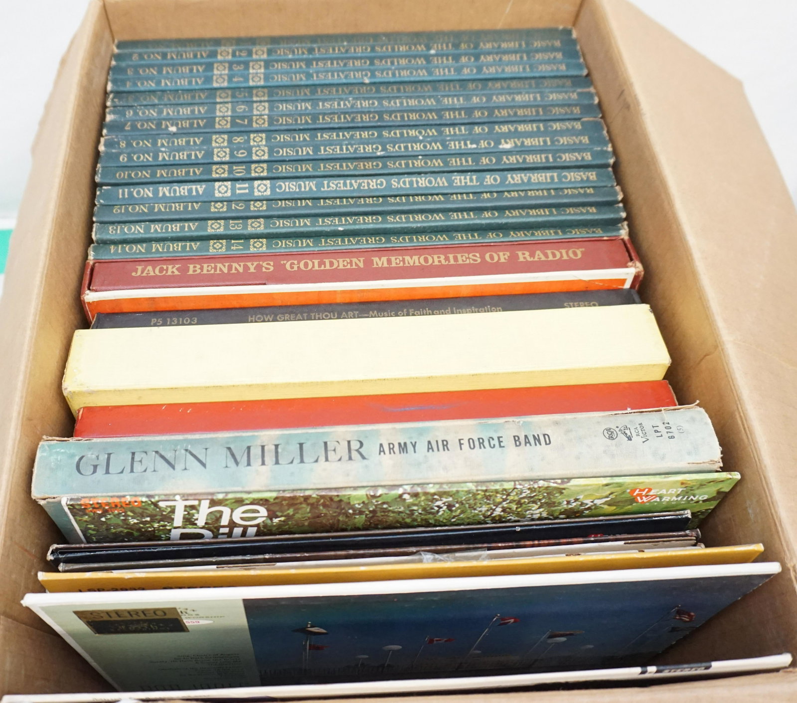 LARGE LOT VINTAGE LPS: Includes 14 Albums of the Basic Library of the Worlds Greatest Music. Jack Benny Golden Memories of Radio Set, Mexicali Brass Set. Glenn Miller Army Air Force Band Library Set, Mood Music Set plus 20 