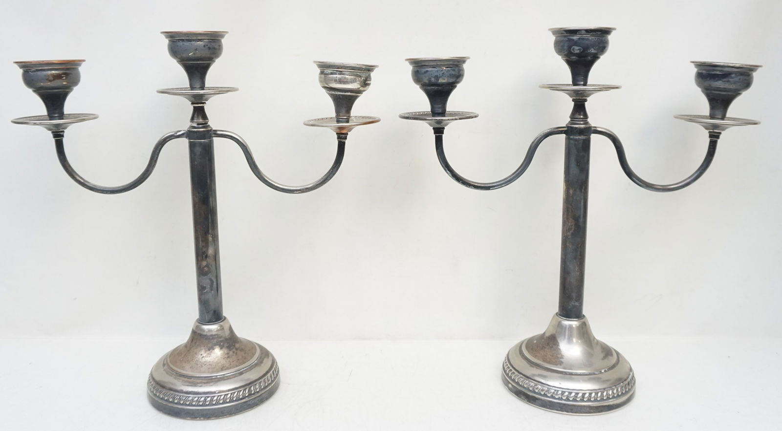 PAIR SILVER PLATE CANDELABRA: Pair of Vintage Sheffield Silver on Copper 3 Arm Candelabra. Each14 3/4" tall and 14" wide. Weight 5 pds 2 oz. Some wear