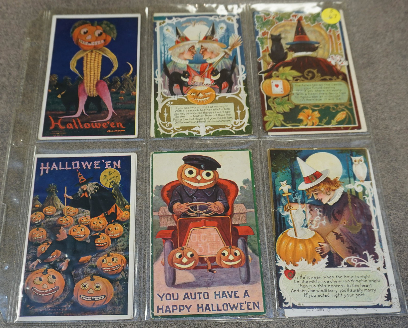 12 ANTIQUE HALLOWEEN POSTCARDS: 12 Original Early 20th c. Collectible Halloween Die Cut, Embossed, Litho Postcards.. Makers include International Art Publishing, Nash Publishing, Leubrie & Elkus Linen Series . PROVENANCE: A Charlest