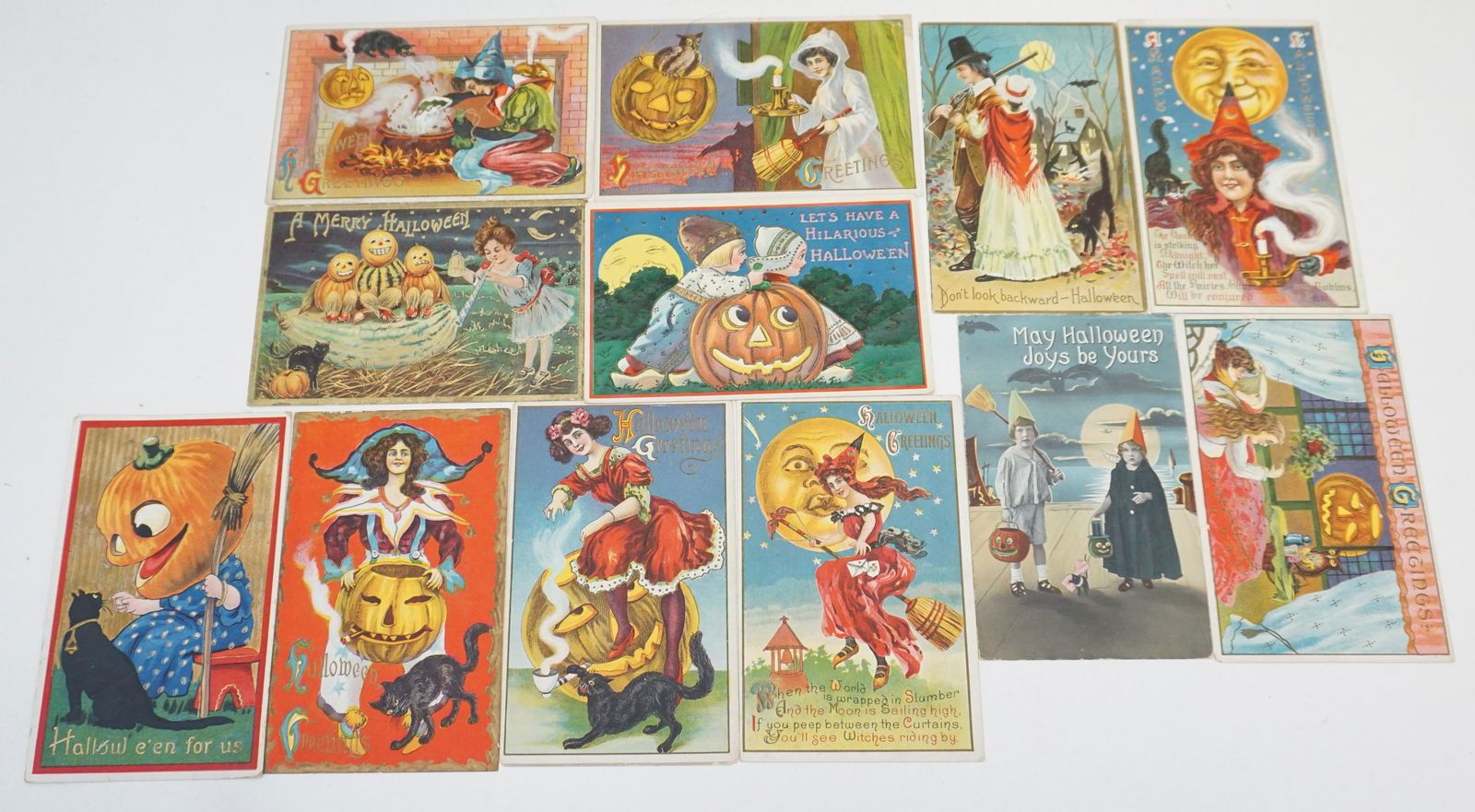 12 ANTIQUE HALLOWEEN POSTCARDS: 12 Original Early 20th c. Collectible Halloween Die Cut, Embossed, Litho Postcards. Publishers Anglo American, Barton & Spooner, Santway PROVENANCE: A Charleston SC Private Estate