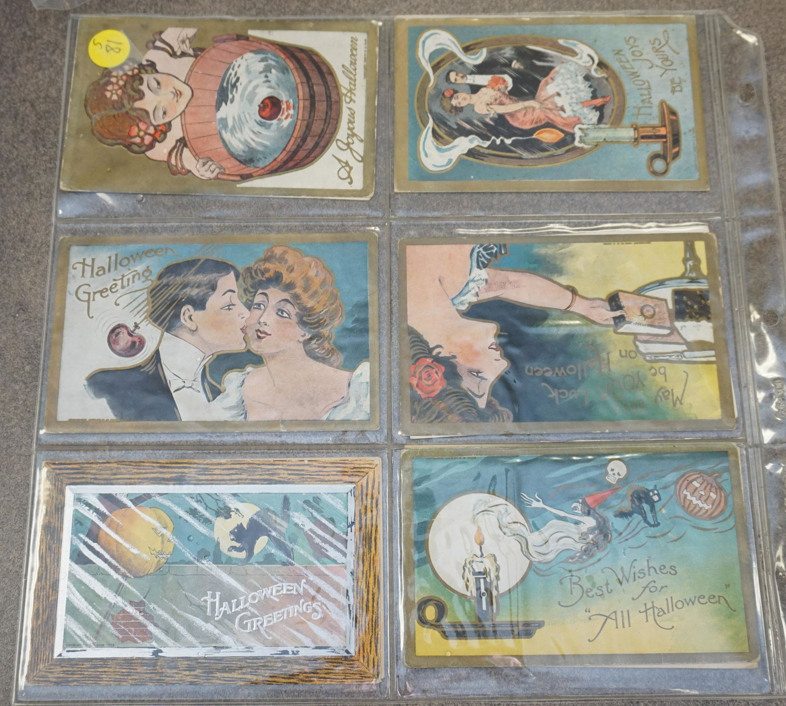 12 ANTIQUE HALLOWEEN POSTCARDS: 12 Original Early 20th c. Collectible Halloween Die Cut, Embossed, Litho Postcards. Publishers include The Rose Co., F.A. Owen, Sanders. PROVENANCE: A Charleston SC Private Estate