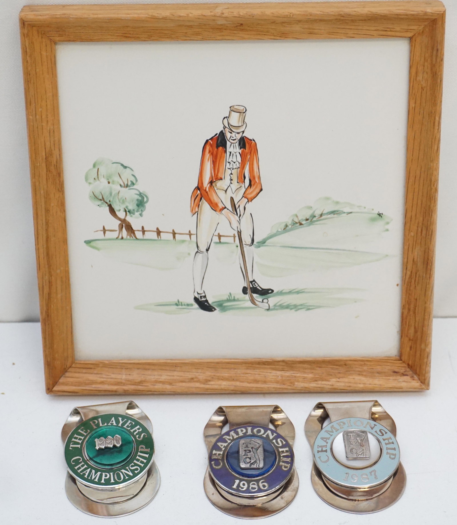 4 pc P.J. BOATWRIGHT GOLF MEMORABILIA: All from the P.J. Boatwright Estate. 1- Hand Painted Tile of a Gentleman Golfer, a gift from Joe Dey, Jr. PGA commissioner. 6 3/4". 2- 1987 TPC Players Championship Money Clip. 3- 1986 TPC Players Cha