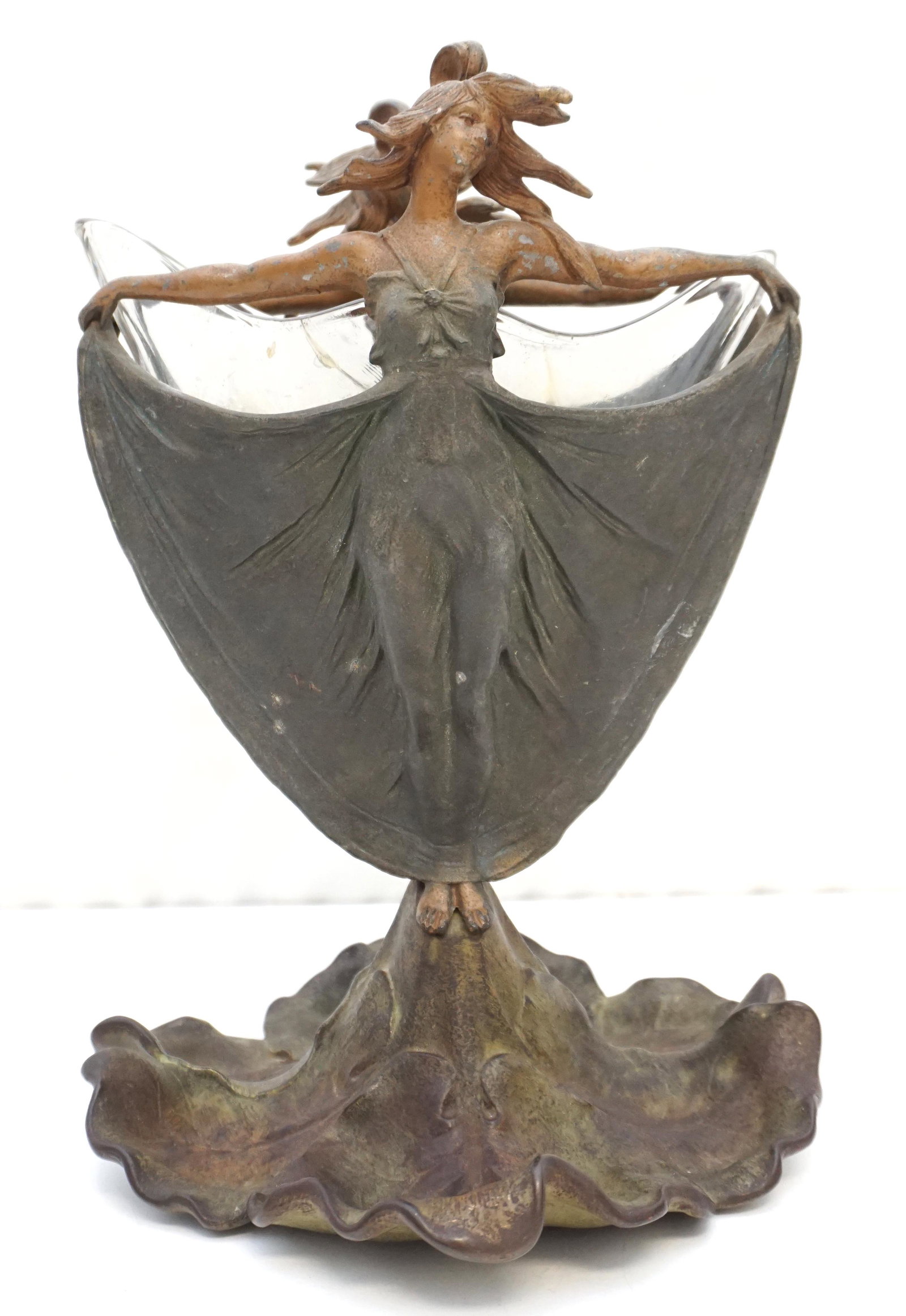 ART NOUVEAU FIGURAL PATINATED METAL VASE: Antique Art Nouveau Patinated Metal Vase. Mirror image of art nouveau style maiden on either side, rising from the foliate base. Unsigned, marked 5580 on base. Sold with shaped glass insert, however i