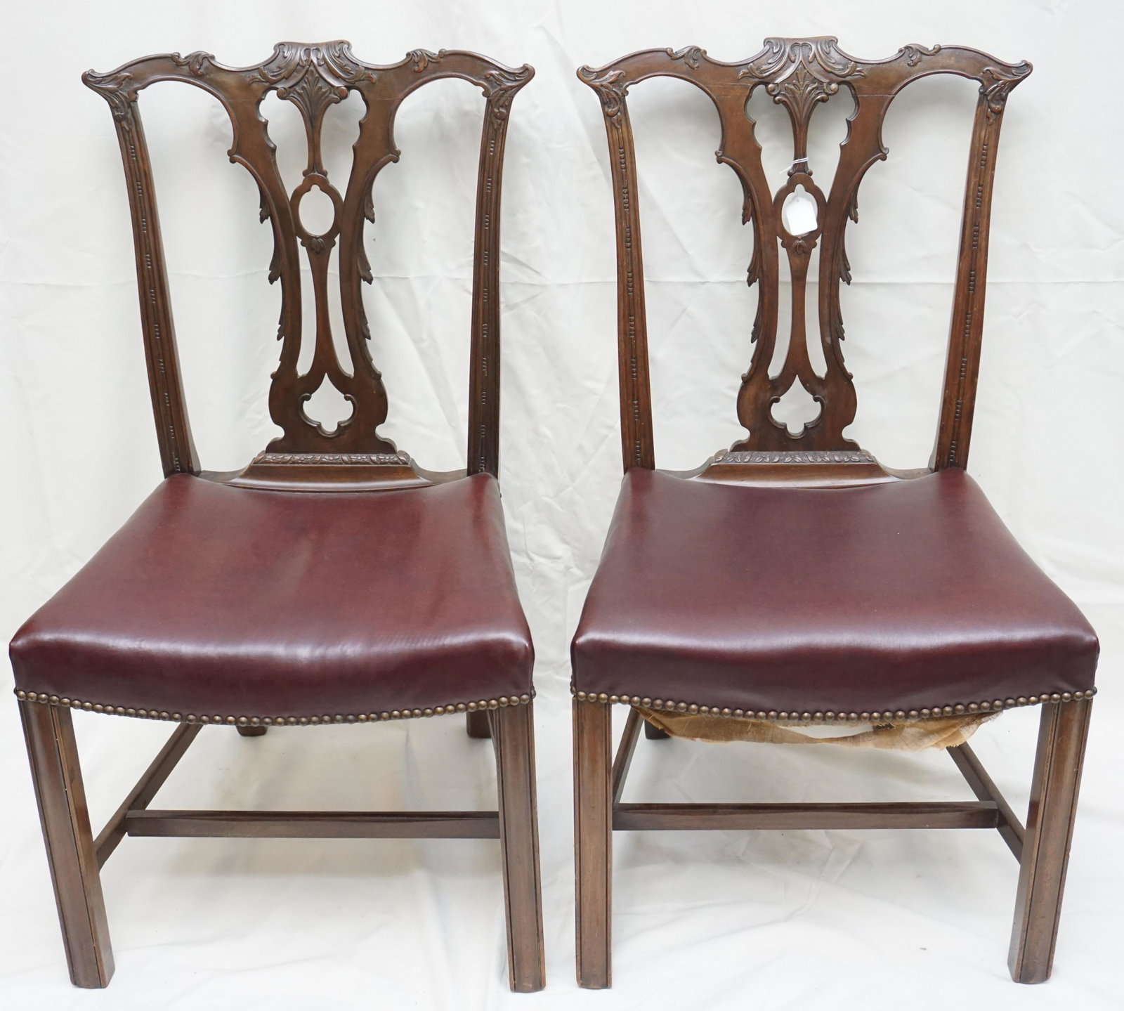 PAIR CHIPPENDALE CHAIRS BOSTON: Pair of antique fancy carved Chippendale style carved side chairs, Boston. Each 19"x22"38" tall. PROVENANCE: A Charleston SC Private Estate. NO IN HOUSE SHIPPING ON THIS LOT. ***Pickup only or Shippin