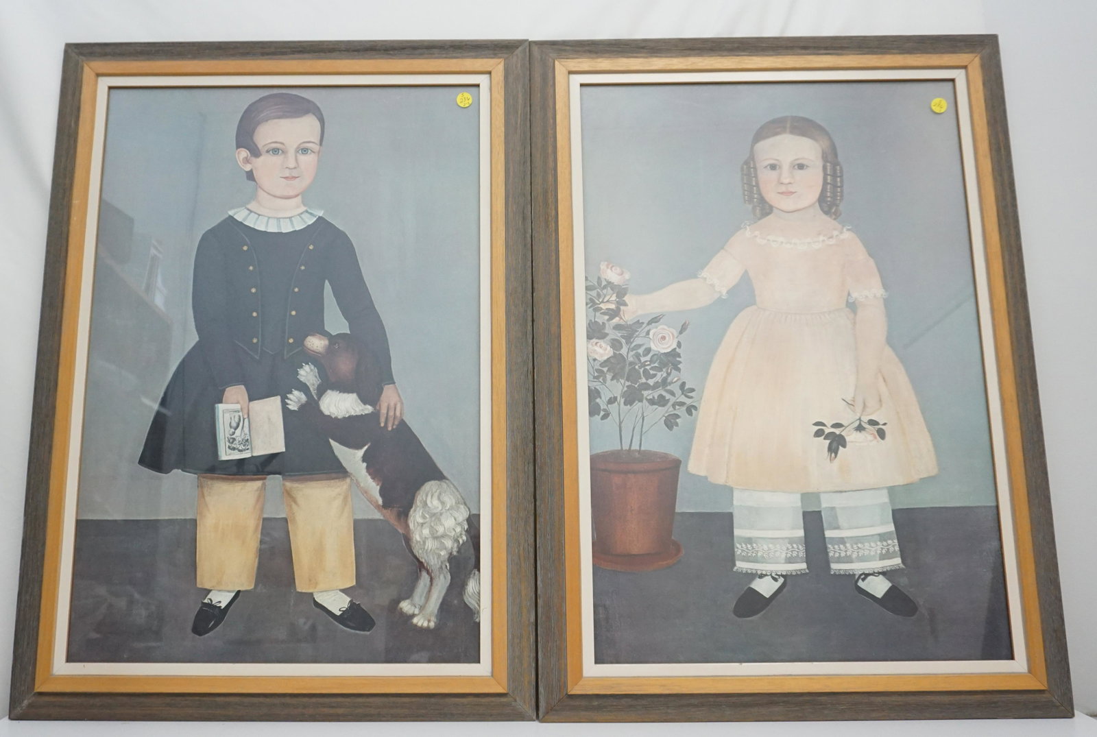 2 FOLK ART SAMUEL MILLER PRINTS: Two Folk Art Prints of Children after Samuel Miller (1807-1853). Both after the original paintings by Miller titled Young Boy with Dog and Young Girl with Flowers both housed at the de Young Museum, S