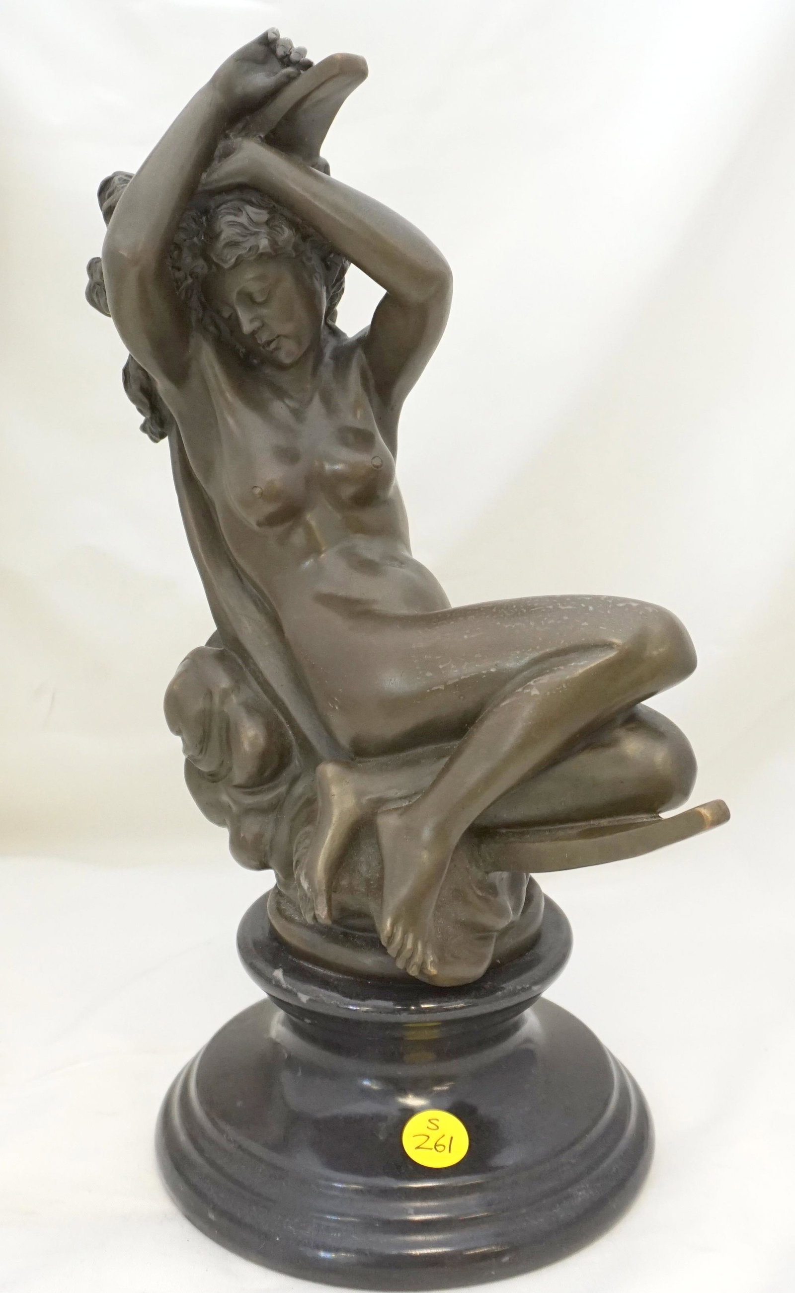 DENECHEAU DIANA RECLINING ON A MOON BRONZE SCULPTURE: 20th c. Diana after Seraphin Denechau. Signed S.Denechau .Bronze with brown patinations, on a black marble plinth. Seraphin Denechau studied under Rude and David D'Angers, and exhibited at the Salon f