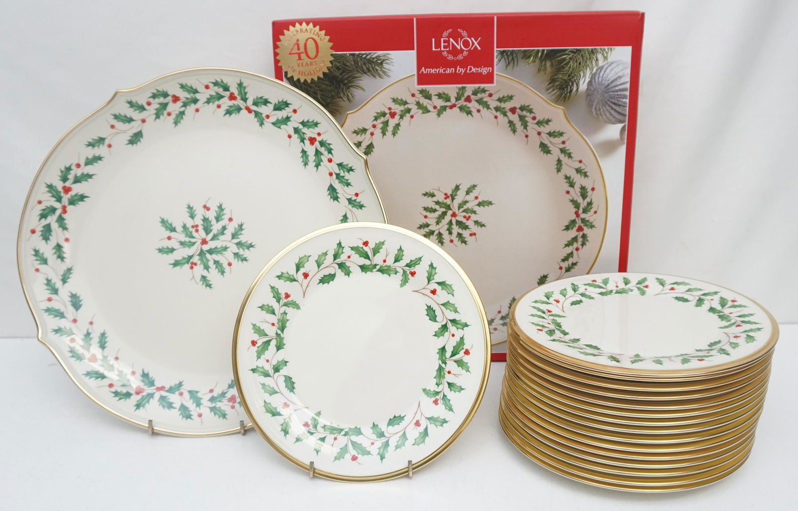 LENOX HOLIDAY PLATTER + 16 DESSERT PLATES: Lenox Holiday Platter 13" still in box and Sixteen (16) Holiday (Dimension) Fine Bone China Dessert Plates from Lenox. New, unused, with the price tags still on. Dimension Shape, Holly, Berries, Gold