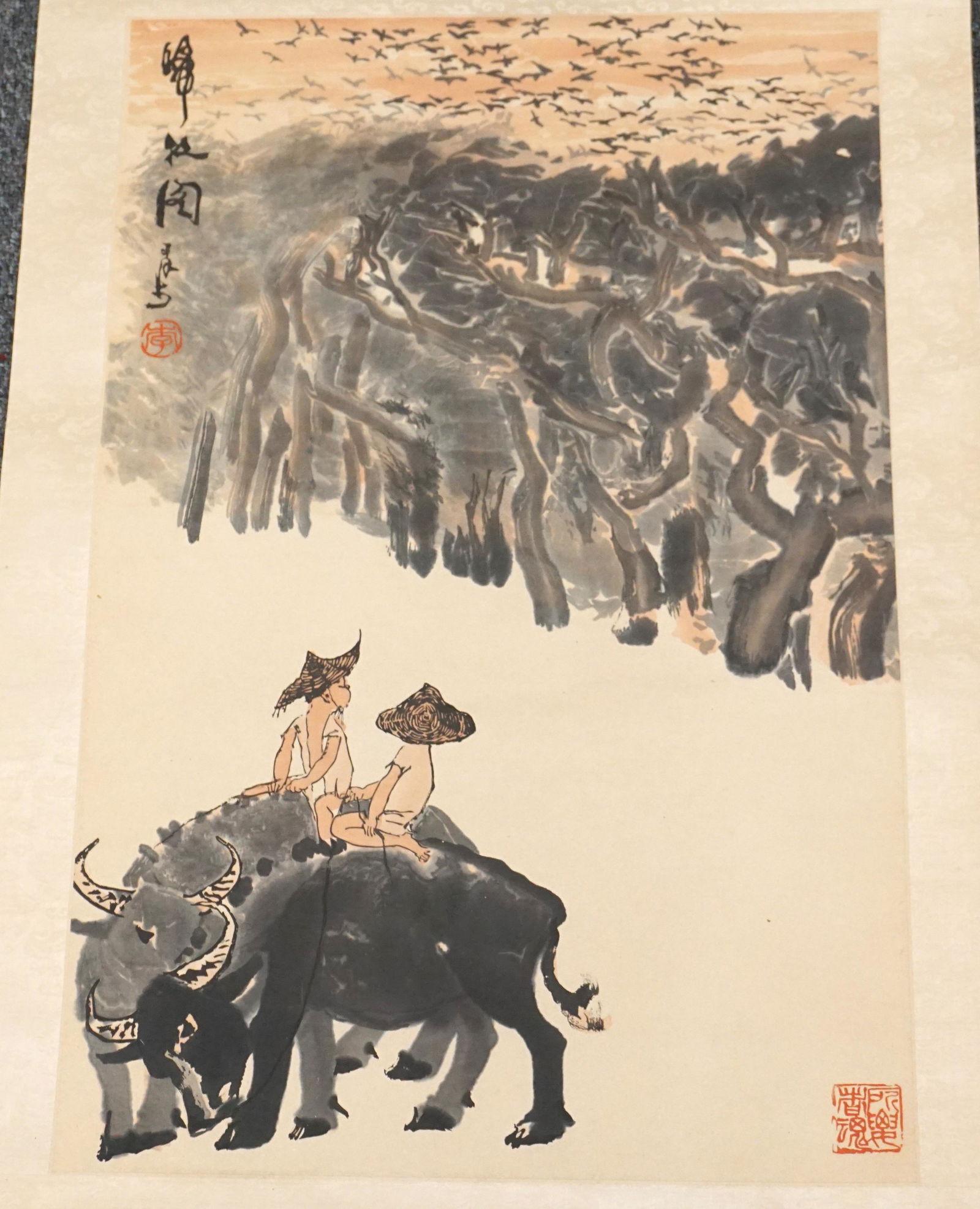LI KERAN (1907-1989) PRINT SCROLL BOYS ON WATER BUFFALO: Vintage Li Keran (Chinese, 1907-1989) Boys on Water Buffalo Fine Print Scroll. Signed with two Li Keran Seals. 60"x22". Top of scroll is partially torn as is bottom. Weight 1 pds 4 oz. PROVENANCE: A P
