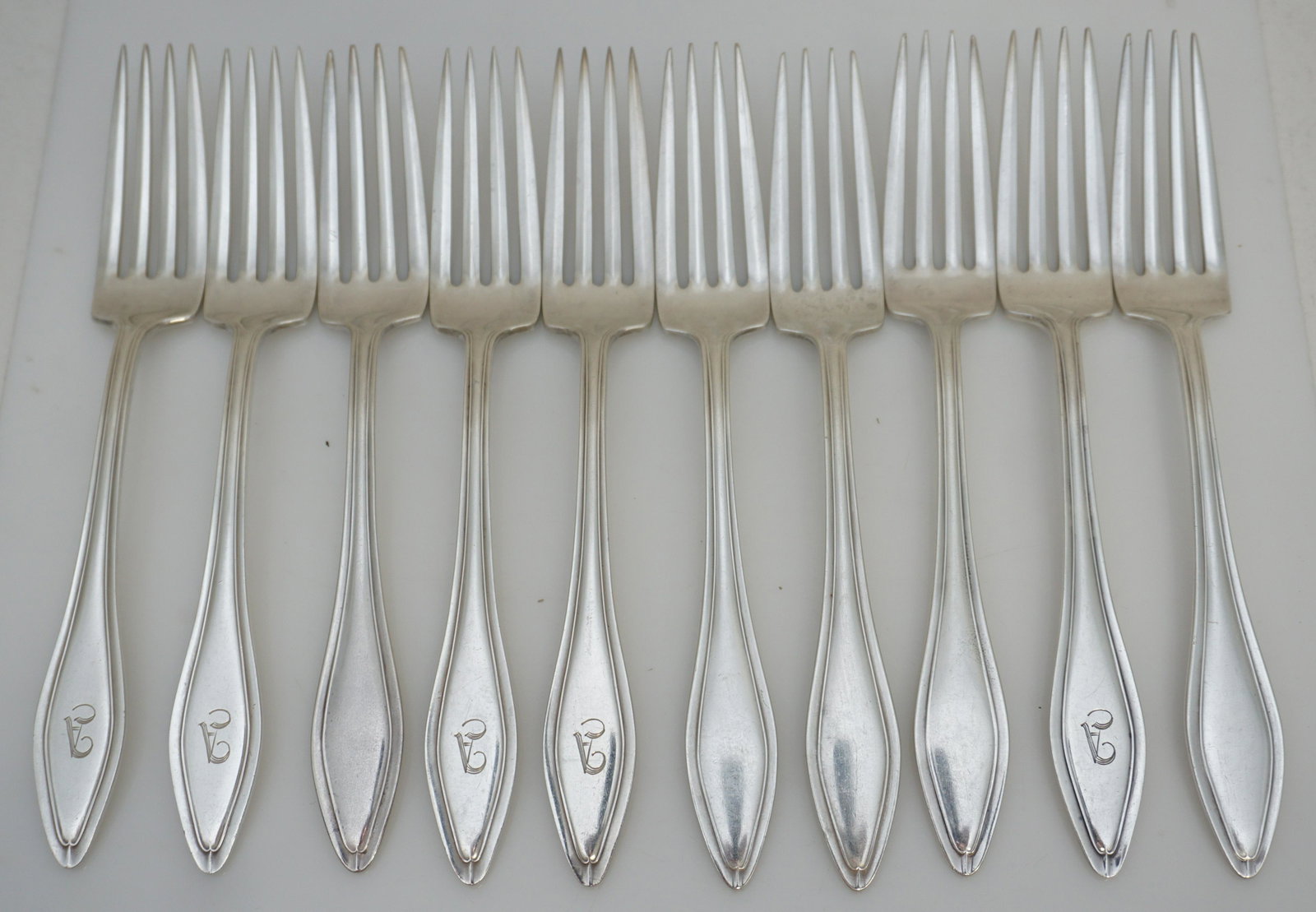 10 TOWLE STERLING 1912 MARY CHILTON FORKS: 10 Towle Sterling Silver 1912 Mary Chilton Dinner Forks. 5 monogrammed A and 5 with no monograms. Each 7 3/4". Weight on all approximately 555 grams. PROVENANCE: A Private Charleston SC Estate.