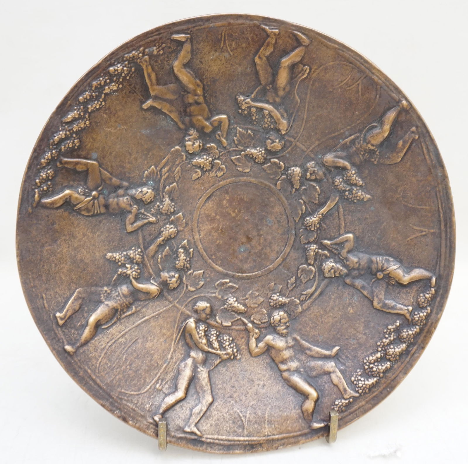 1925 GORHAM BRONZE HARVEST DISH: Gorham Co. Christmas 1925 Patinated Bronze Dish. Made after the Arrentine Bowl from the 1st century B.C. that features Grape Harvest and Wine Making. Measures 7 1/4"x7 1/4"x1". Weight 10 oz. PROVENANC