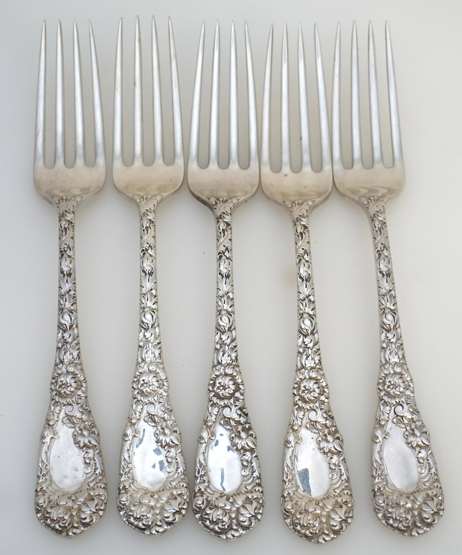 5 STERLING CHRYSANTHEMUM BAILEY BANKS BIDDLE FORKS: Five (5) Substantial Sterling Silver Ornate Repousse Dinner Forks in the 1893 Chrysanthemum Pattern made by Durgin and retailed at Bailey, Banks & Biddle Co. in Philadelphia. Repousse Front and Backs.