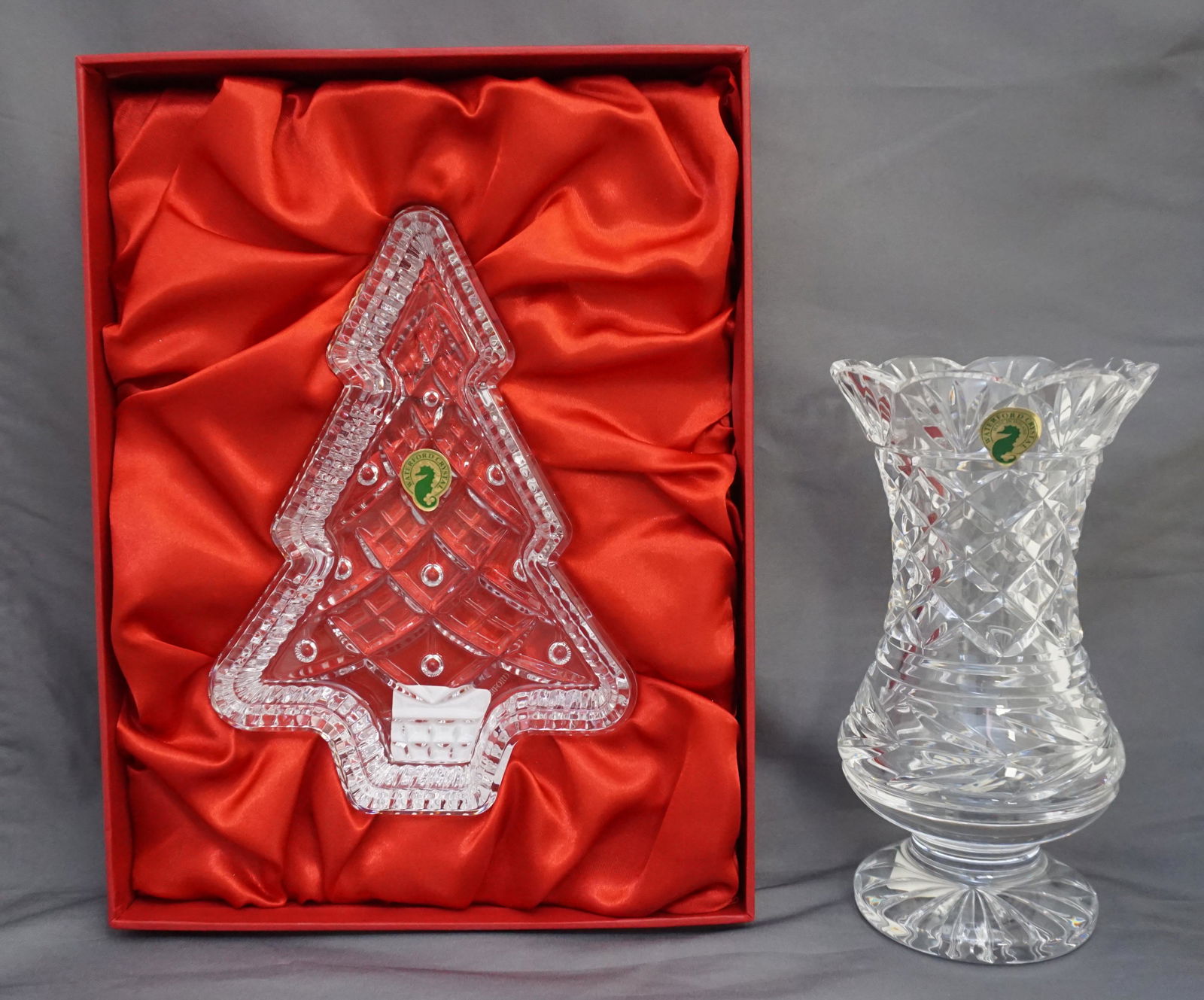 2 pc WATERFORD CRYSTAL VASE + DISH: Waterford Crystal Vase and dish, both in the original boxes. 1- Waterford "Clara" Vase 7", Box 8"x5 1/2"x5 1/2". 2- Waterford Christmas Tree Dish 7 1/2". Box 11"x8 1/2"x2". Weight on all 4 pds 15 oz.