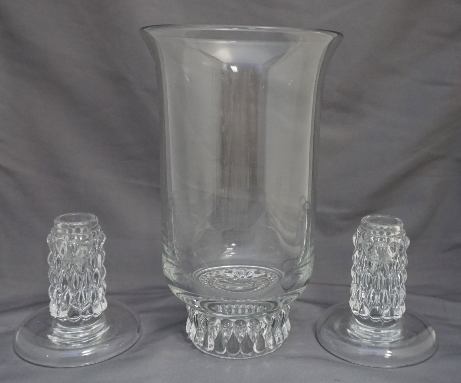 ART DECO 1941 FOSTORIA MYRIAD SET: Vintage Scarce Art Deco Fostoria Glass "Myriad" Pattern Vase and a Pair of Candlesticks. Vase 5 1/2"x5 1/2'X8 3/4", Candlesticks 3 1/2". Weight on all 5 pds 11 oz. PROVENANCE: A Private Charleston SC