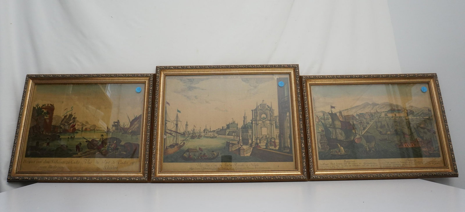 3 FRAMED ANTIQUE PORT ENGRAVINGS: 3 Antique Framed Port Engravings. In matching wood frames. The prints have been glued to cardboard and varnished. Some wear.Framed under glass. 19 1/2"x15 1/2" and 14"x19"x1". Weight 10 pds. PROVENANC