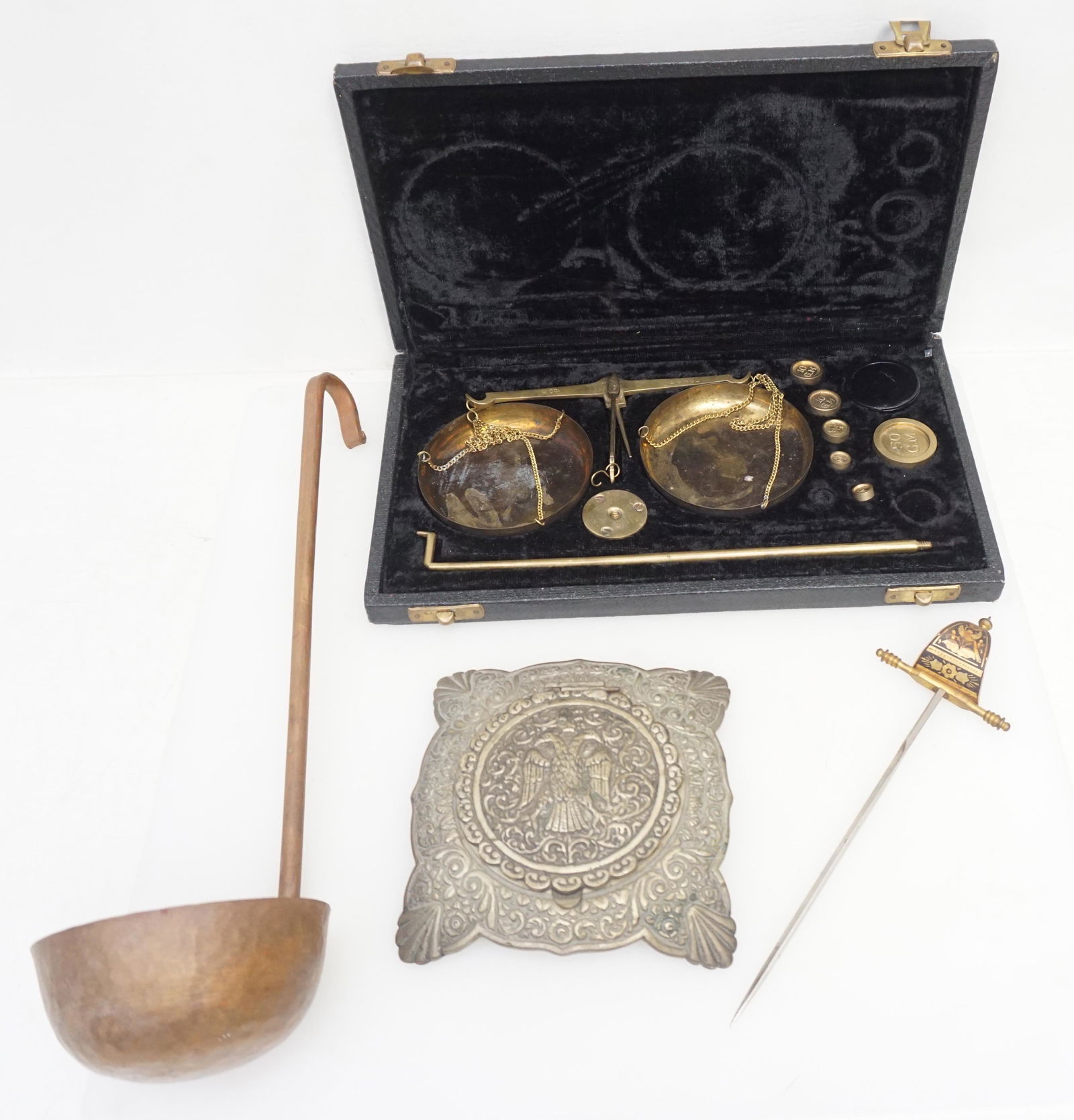 4 pc ANTIQUE / VINTAGE BOX LOT: All are Antique or Vintage. 1- Toledo Spain Damascened Letter Opener 8". 2- Russian Eagle Mirror for Desk or Vanity Top 4 1/2". 3- Hand Hammered Copper Ladle 12". 4- Vintage Traveling Scale, missing 3