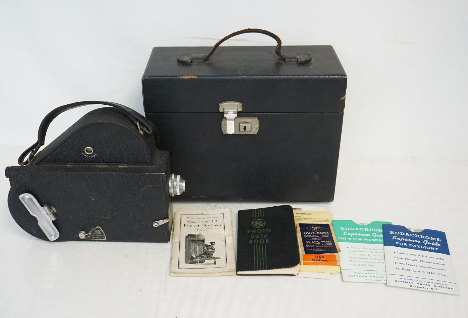 1936 CINE KODAK MOVIE CAMERA: Vintage 1936 Cine-Kodak Model E 16mm Movie Film Camera in the original case. This is a wind-up (crank) motor camera. Includes original instructions and photo data book, lens tissues, exposure guide an