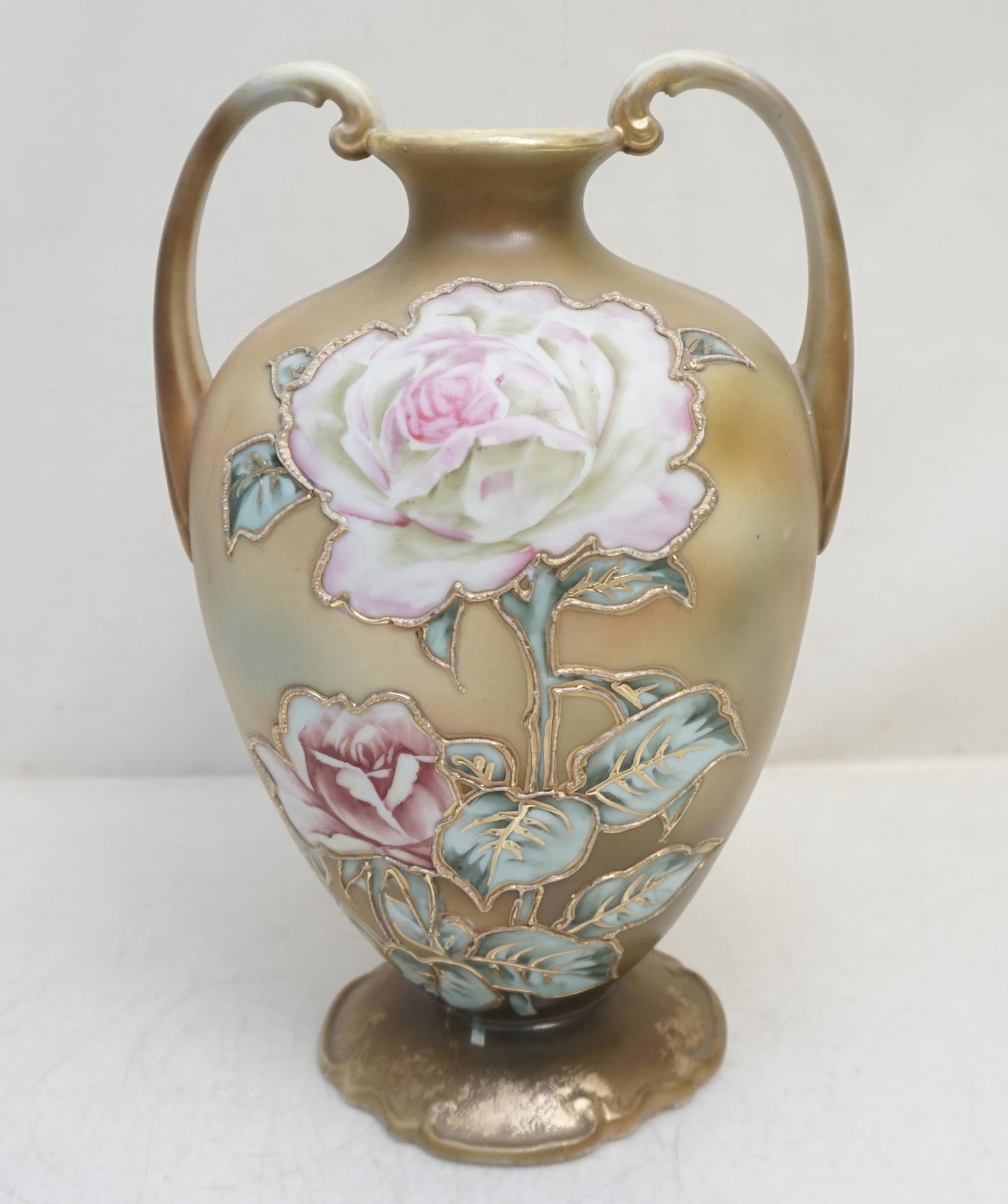 NIPPON HAND PAINTED ROSES VASE: Hand Painted Pink Roses Nippon Vase with heavy gilt enameling. 7 1/4"x5"x10 1/4". Weight 2 pds 4 oz.