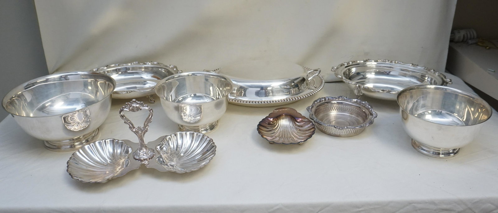 9 pc AMERICAN SILVERPLATE BOWLS, VEGETABLES: All are Vintage Silverplate. 1- Set of Three Revere Reproduction Silver Plate Bowls 7"x4" and 9"x 4 1/2". 2- Poole Silver heavy silver plated on copper wine coaster, pierced gallery 6 1/4"x1 1/2". 3-