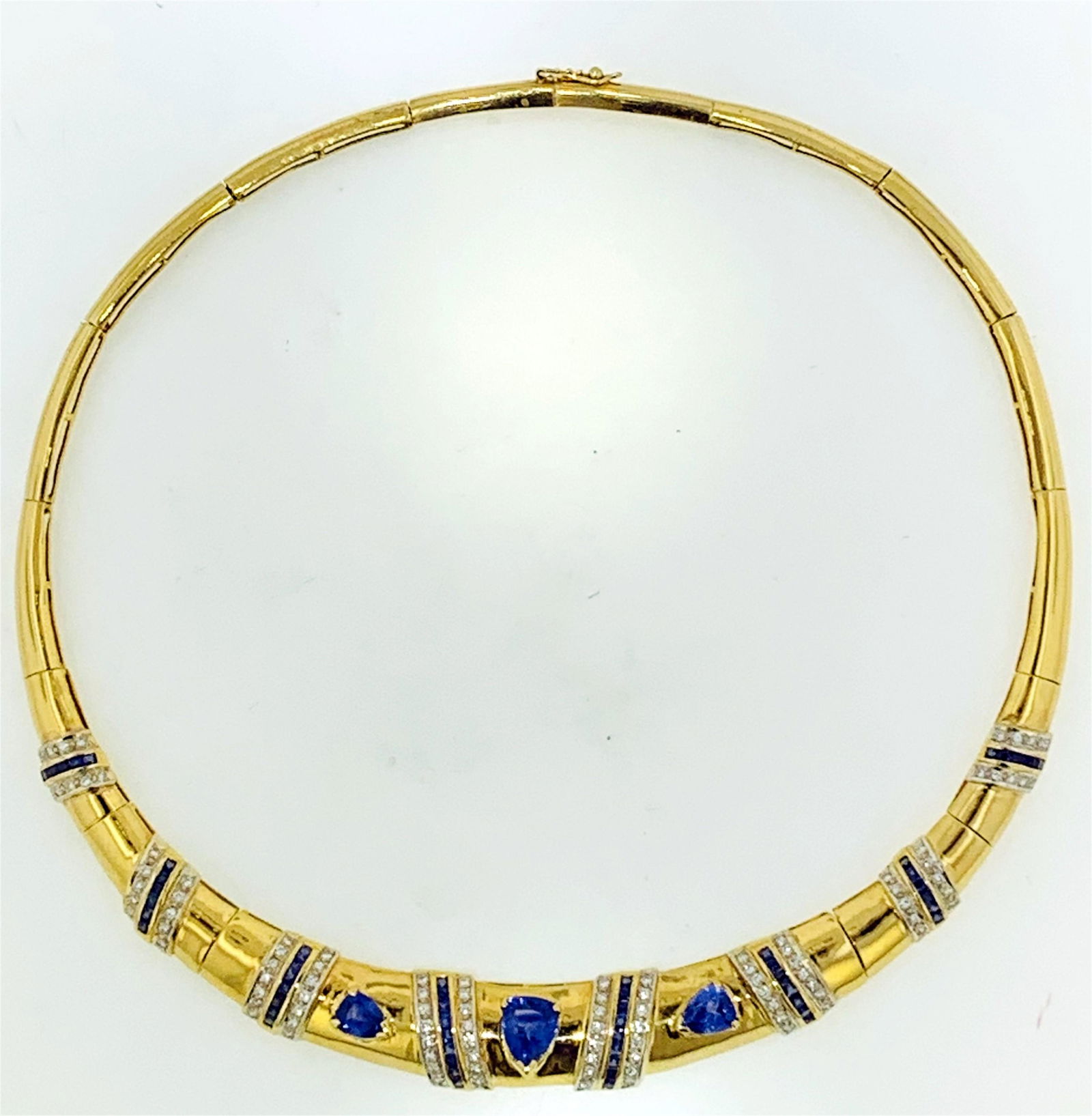 18KT GOLD SAPPHIRE & DIAMOND HINGED OMEGA NECKLACE (1 of 6)