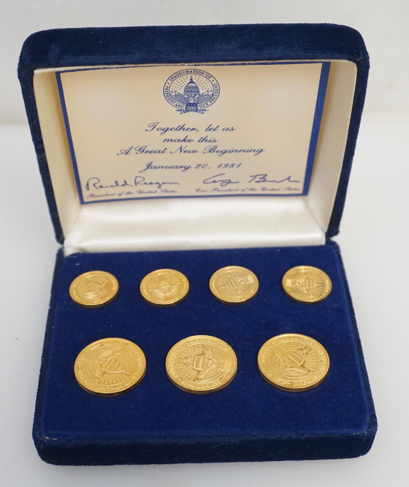 1981 INAUGURATION BRASS BLAZER BUTTON SET (REAGAN/BUSH): Vintage 1981 commemorative Inaugural Blazer Button Set By Ben Silver from the inauguration of President Ronald Reagan and Vice President George H. W Bush. In Original packaging. Weight 6 oz. PROVENANC