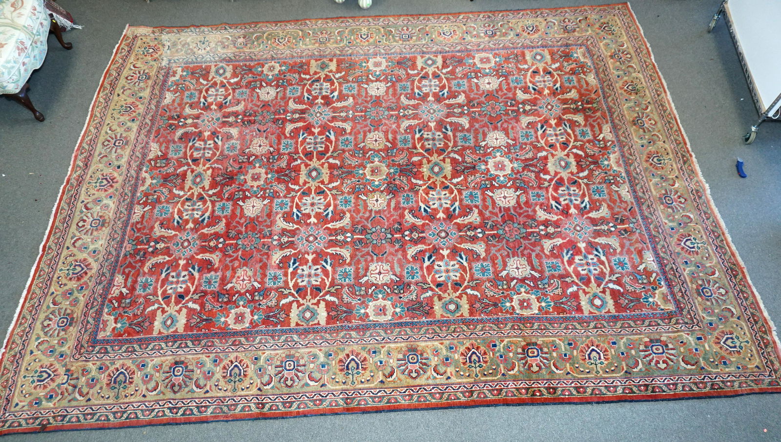 LARGE SEMI ANTIQUE HAND KNOTTED MAHAL RUG: Large Semi Antique Hand Woven Persian Mahal Rug c. 1930. Measures 10 feet 8 inch x 13 feet 9 inch. Northwestern Iran, Wool pile on cotton warp and welt. 180 knots per inch. Red field, ivory border. Ca