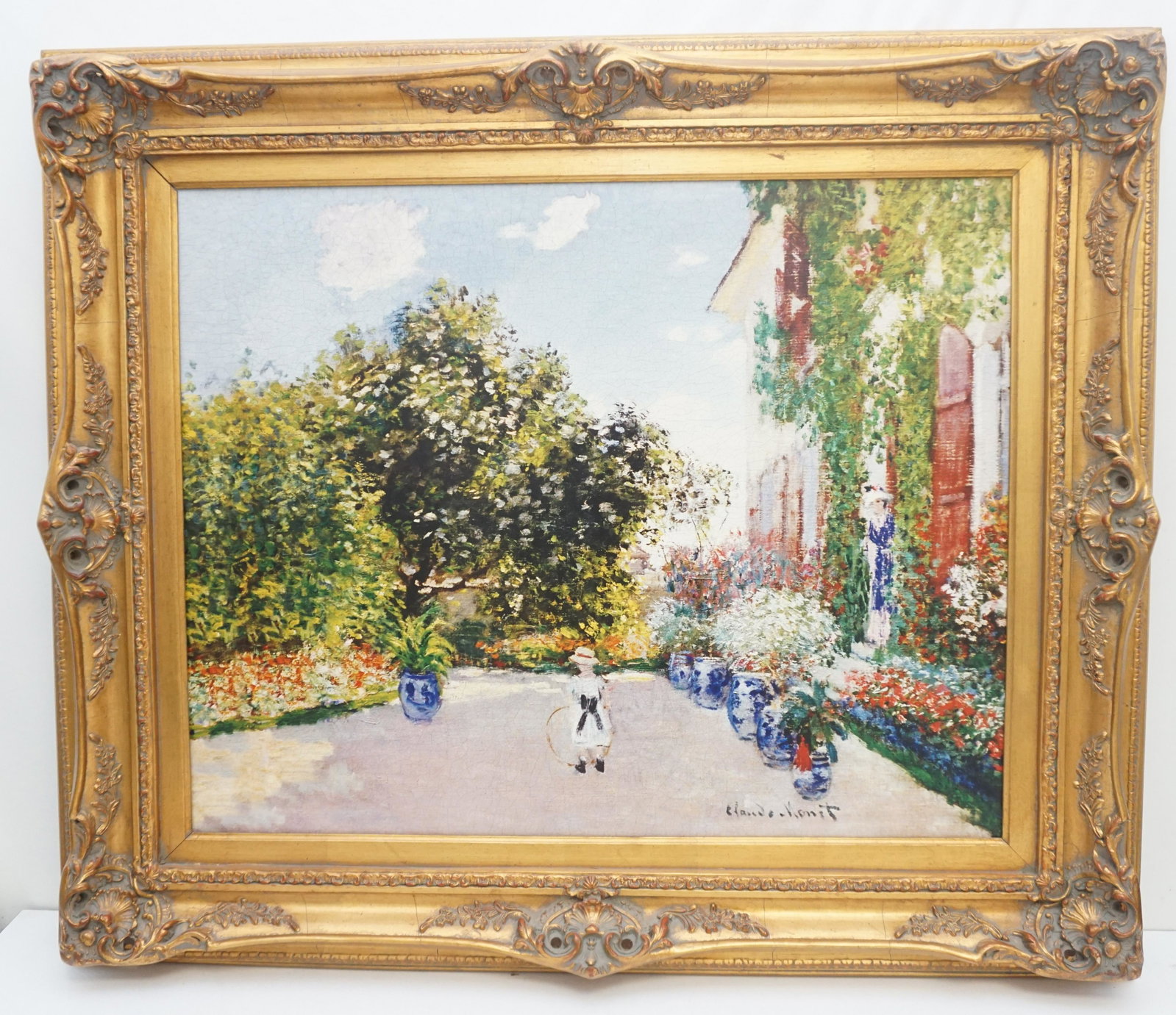 LARGE ORNATE WOOD & GESSO FRAME W MONET GICLEE: Large Monet Giclee the "Artists House at Argenteuil". In large ornate gilt wood and gesso frame. Measures 33"x40"x3". Weight 11 pds. NO IN HOUSE SHIPPING ON THIS LOT. PROVENANCE: A Private Charleston 