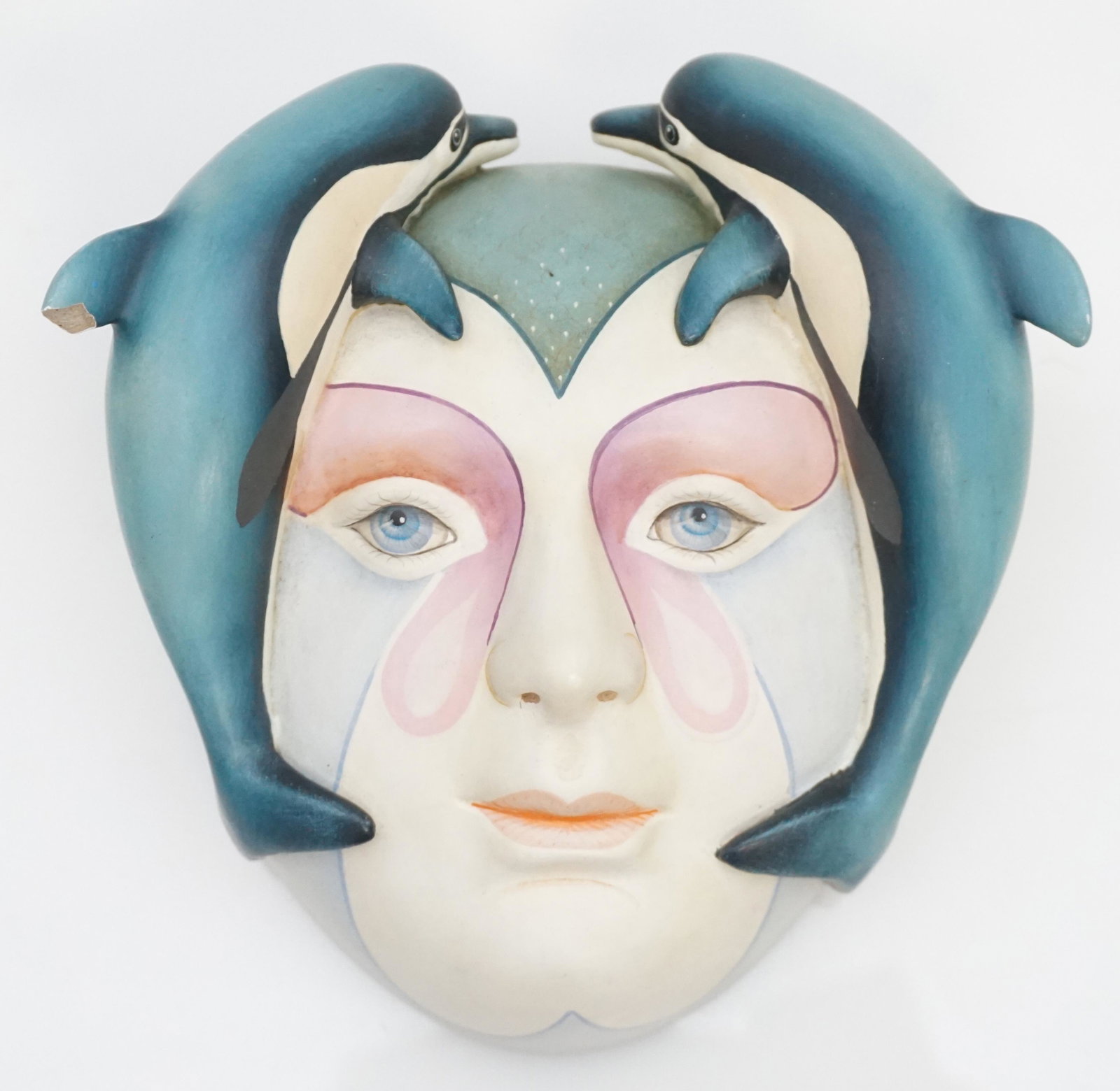 SERGIO BUSTAMANTE DOLPHIN MASK SCULPTURE: Signed limited edition dolphin mask sculpture by Sergio Bustamante (1942- Mexico) Crafted of plaster with hand painted finish in vibrant colors Signed and numbered 54 by the artist, limited edition nu