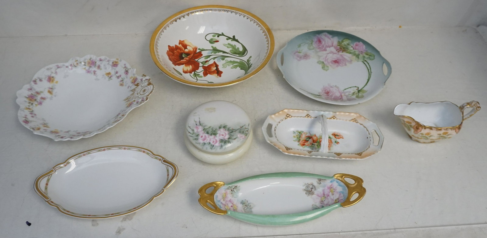 8 PC ANTIQUE LIMOGES + GERMAN PORCELAIN: All are antique. 1- Jean Pouyat Limoges France Bowl 10 1/4". 2- Potteries Co-operative Gilded Edge Poppy Bowl 10". 3- Coiffe Limoges France Hand Painted Oval Dish with Gilt Handles 10". 4- Theodore Ha