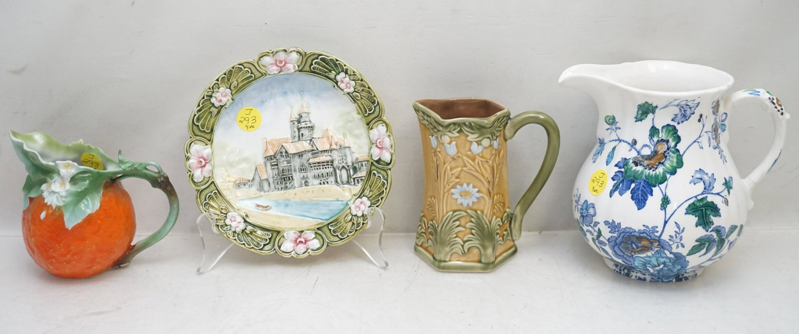 4 PITCHERS - PLATE - ROYAL BAYREUTH - MAJOLICA: 1- Royal Bayreuth Orange Blossom Creamer 4 1/4". 2- Mason's Ironstone Belvedere Pitcher 6". 3- Majolica Small Jug, no marks 4 3/4". 4- Majolica Small Plate with Castle, nick to rim 6 1/4". Weight on a