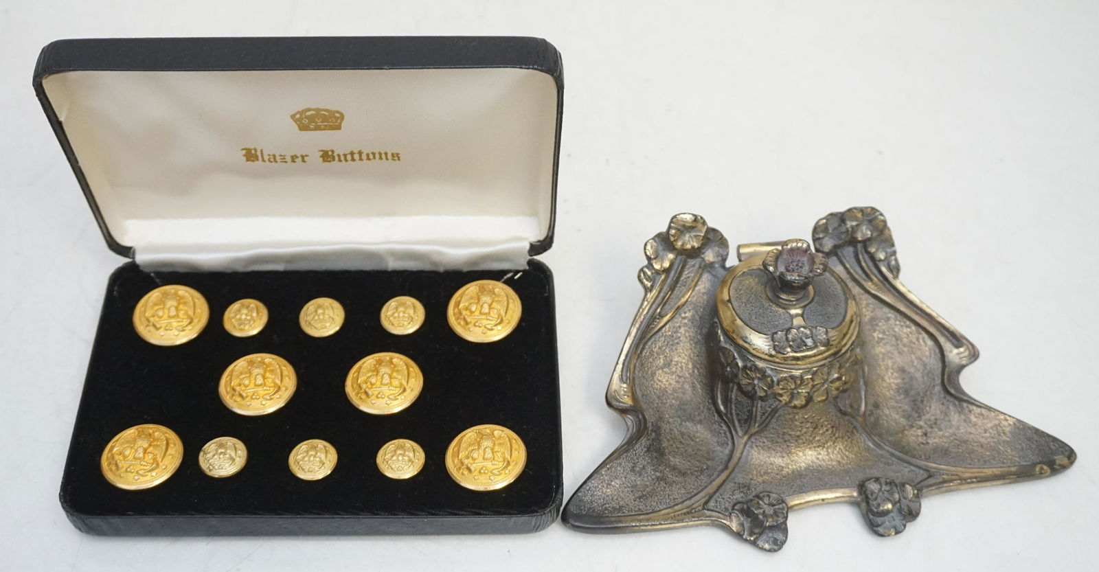 ANTIQUE BRASS INKWELL & VTG BLAZER BUTTONS: 1-Vintage Set of Rolled Gold Blazer Buttons, in the original Box. 12 Buttons total. 2- Antique Brass Art Nouveau Inkwell, no glass insert 6 1/2". Weight combined 1 pd 7 oz. PROVENANCE: A Private Charl