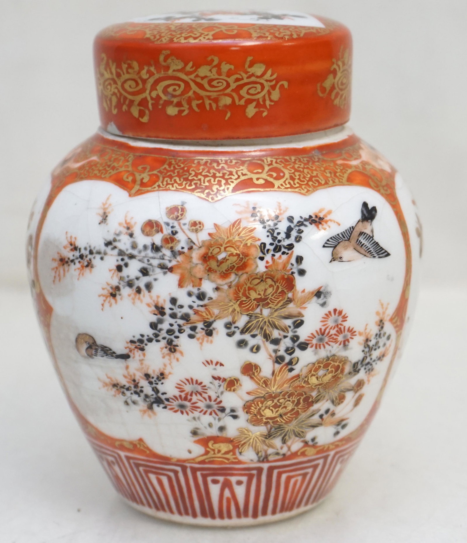 ANTIQUE JAPANESE KUTANI TEA CADDY: Antique well painted Japanese Kutani Porcelain Tea Caddy c. 1880. Hand Painted and still has the original inner cap lid.. Signed on bottom with mark for Kutani zo, Wataya Sei. Meiji Period (1868-1913)