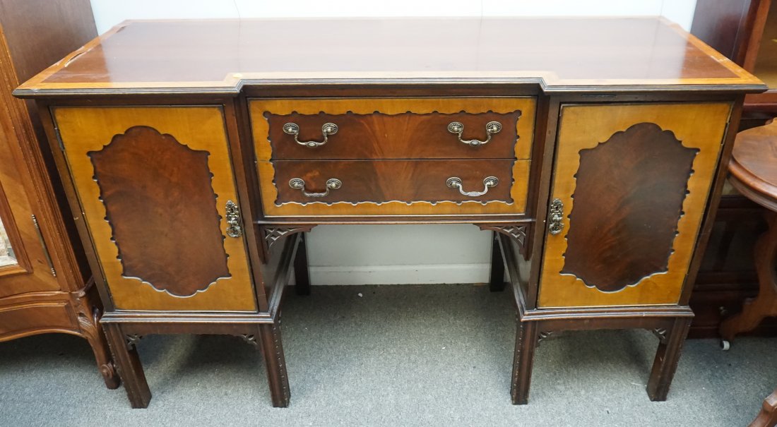 VINTAGE MAHOGANY INLAID SIDEBOARD: Vintage Mahogany Sideboard with Inlaid Banding and Shaped Panels. Two Drawer Center and Two door sides. There is some loss to veneer and scratches to top. 60"x22"x36" NO IN HOUSE SHIPPING ON THIS LOT.