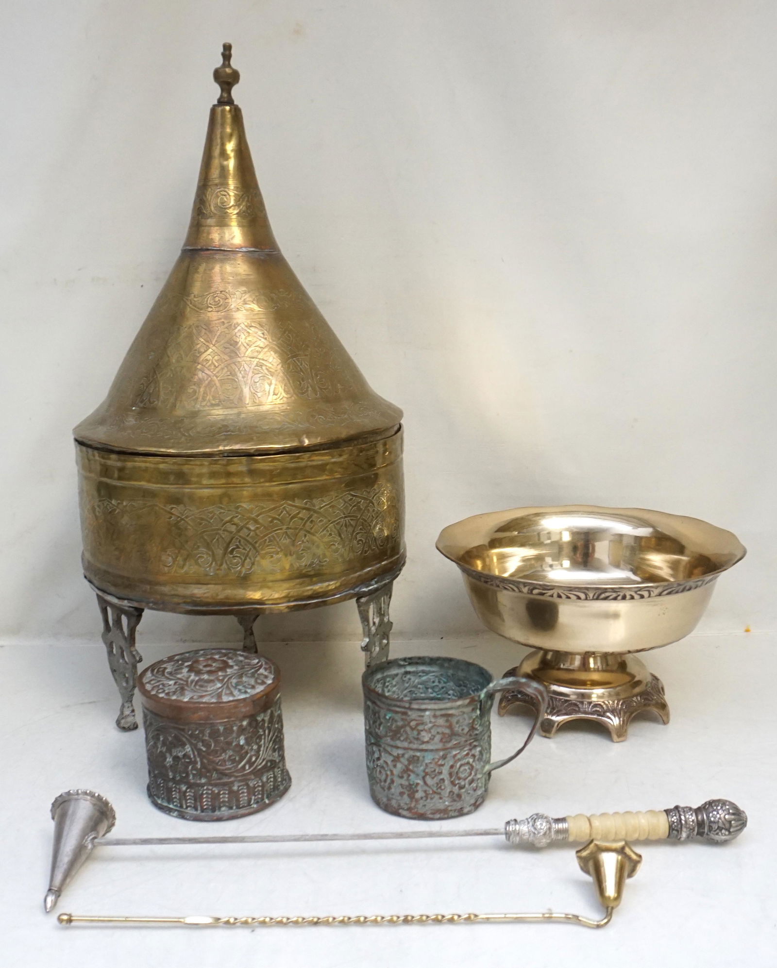 6 pc GROUPING ARABIC BRASS / COPPER: 1- Large Antique Hand Hammered Brass Domed Covered Tagine, Morocco. Lid does not fit properly 9"x9"x18 1/2". 2- Cup 3 1/4". 3- Middle Eastern Antique Hand Hammered Copper Box 3 1/4. 4- Footed Brass Bo