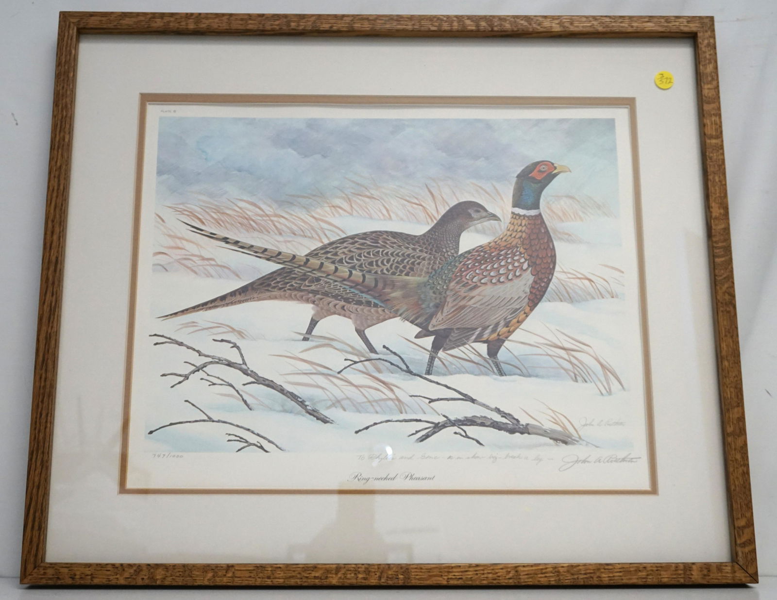 JOHN RUTHVEN SIGNED RING-NECKED PHEASANT LITHO: The print is titled "Ring-Necked Pheasant", numbered 747/1000 and pencil and printed signatures are lower right. Professionally framed in oak frame and double matted 26"x22"x1 1/2". Weight 9 pds. PROV
