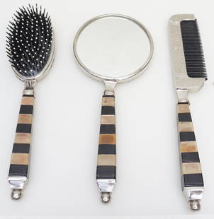 3 pc CONTEMPORARY INLAID VANITY SET: 3 Piece Contemporary Art Deco Style Inlaid Vanity Set. Hand Mirror 9 3/4". Brush 9 1/2". Comb 10 1/4". Weight on all combined 1 pd 7 oz. PROVENANCE: A Private Charleston SC Estate