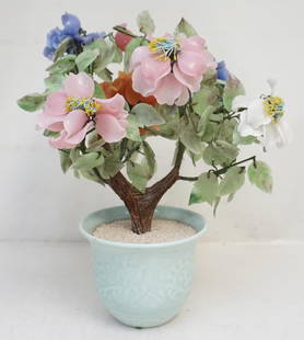 CHINESE JADE TREE IN CELADON PLANTER: Vintage Chinese Jade Tree in Porcelain Celadon Pot. With a Tree whose branches are garnished by jade, and stone leaves and flowers. Measures 10 1/2"x10 1/2"x14". Weight 6 pds 12 oz. NO IN HOUSE
