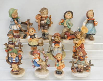 11 FIGURINES 9 HUMMELS plus CARVED WOOD and ARNART: 9 Vintage Older Hummel Figurines, good condition, Tip of umbrella broken off and included. 2- Carved Anri Style Tuba Player. 3- Arnart Erich Stauffer Girl With Broom. Weight on all 3 pds 10 oz.