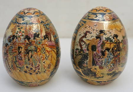 PAIR JAPANESE SATSUMA GEISHA EGGS: Pair of Vintage Japanese Satsuma Porcelain Hand Painted Enameled Eggs. Both feature different scenes of Geishas. Each 4 1/2". Weight combined 14.2 oz. PROVENANCE: A Private Charleston SC Estate