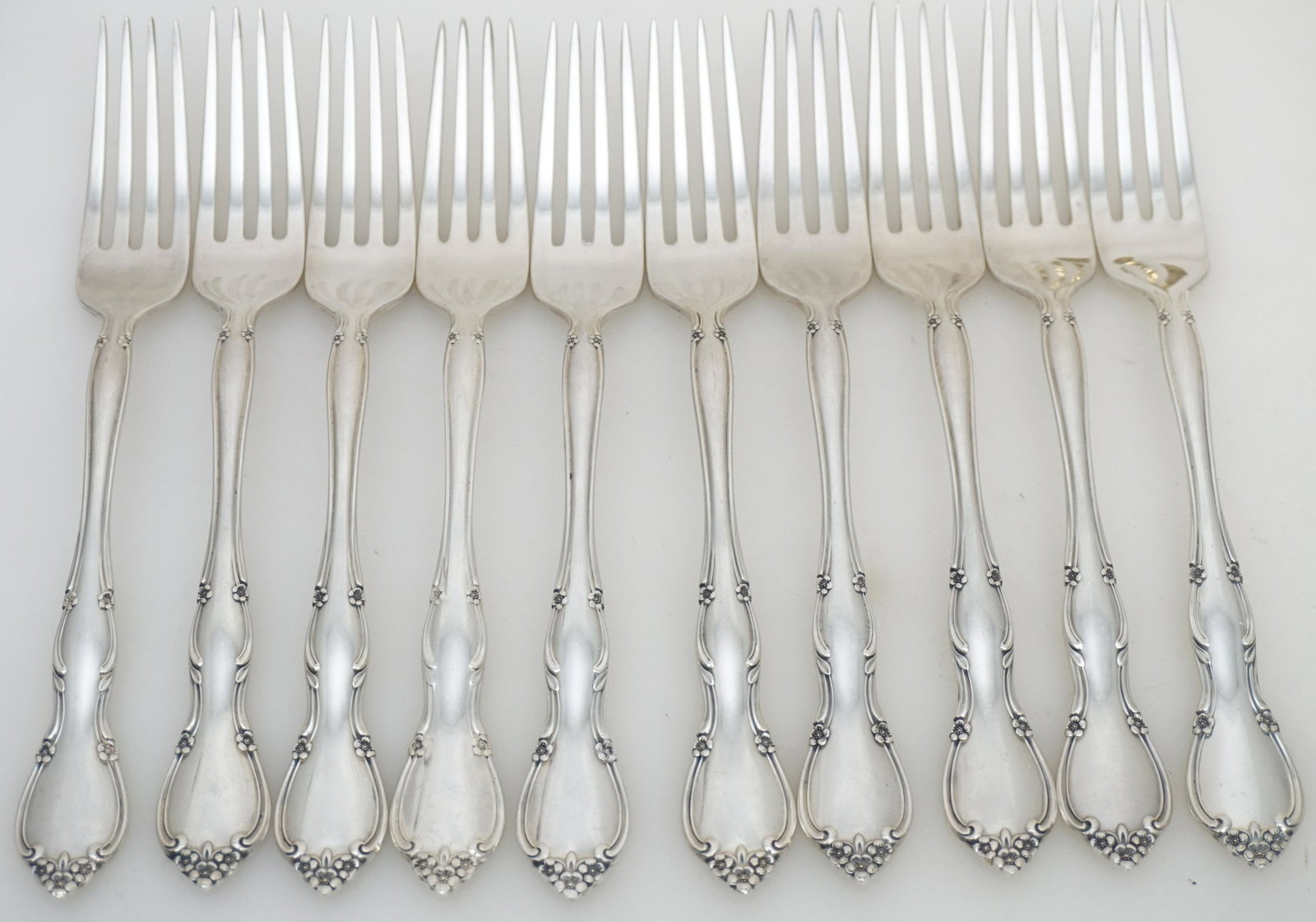 10 GORHAM STERLING ROSE TIARA DINNER FORKS: Ten (10) Gorham Sterling Silver Rose Tiara Dinner Forks. No monograms. Each 7 1/2". Weight approximately 515 grams. PROVENANCE: A Private Charleston SC Estate Rose Tiara was produced by Gorham from 19