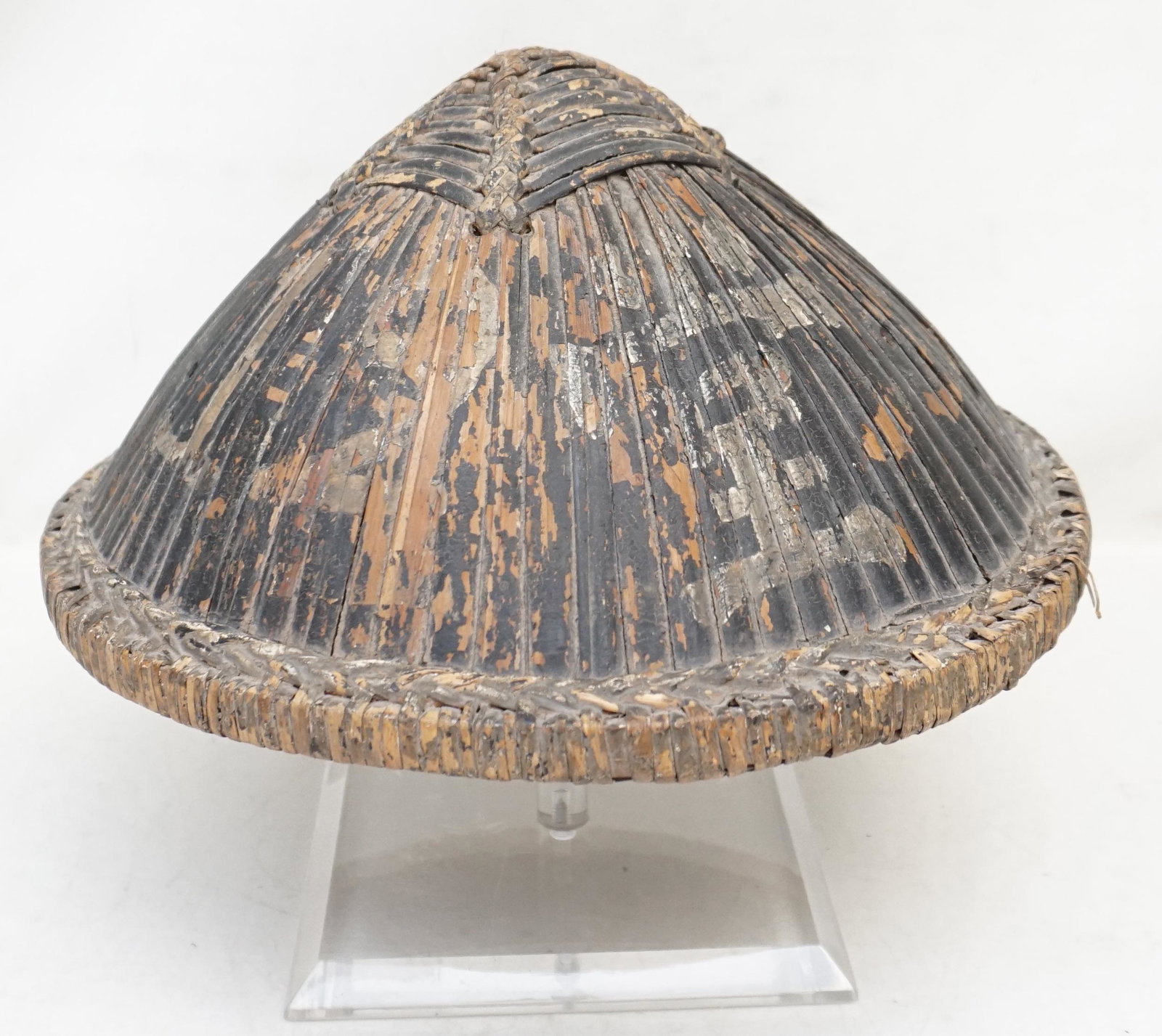 ANTIQUE CHINESE WORKERS HAT AN QUAN MAO: Antique Chinese Workers Bamboo Hat called a An Quan Mao. Early 20th century on Lucite Display Stand. Hat 11 1/2"x11 1/2"x6". Stand 9". Weight 2 pds. PROVENANCE: A Private Charleston SC Estate