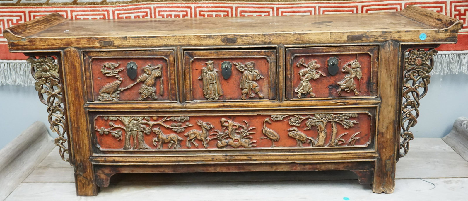QING DYNASTY CHINESE LIANERCHU - ALTAR CHEST: Antique Qing Dynasty Chinese Carved and Lacquered Lianerchu Low Altar Chest. Ornate Carved and Pierced Wood Spandrels and Drawers. Purchased in Beijing. Measures 52"x16"x20".NO IN HOUSE SHIPPING. PROV