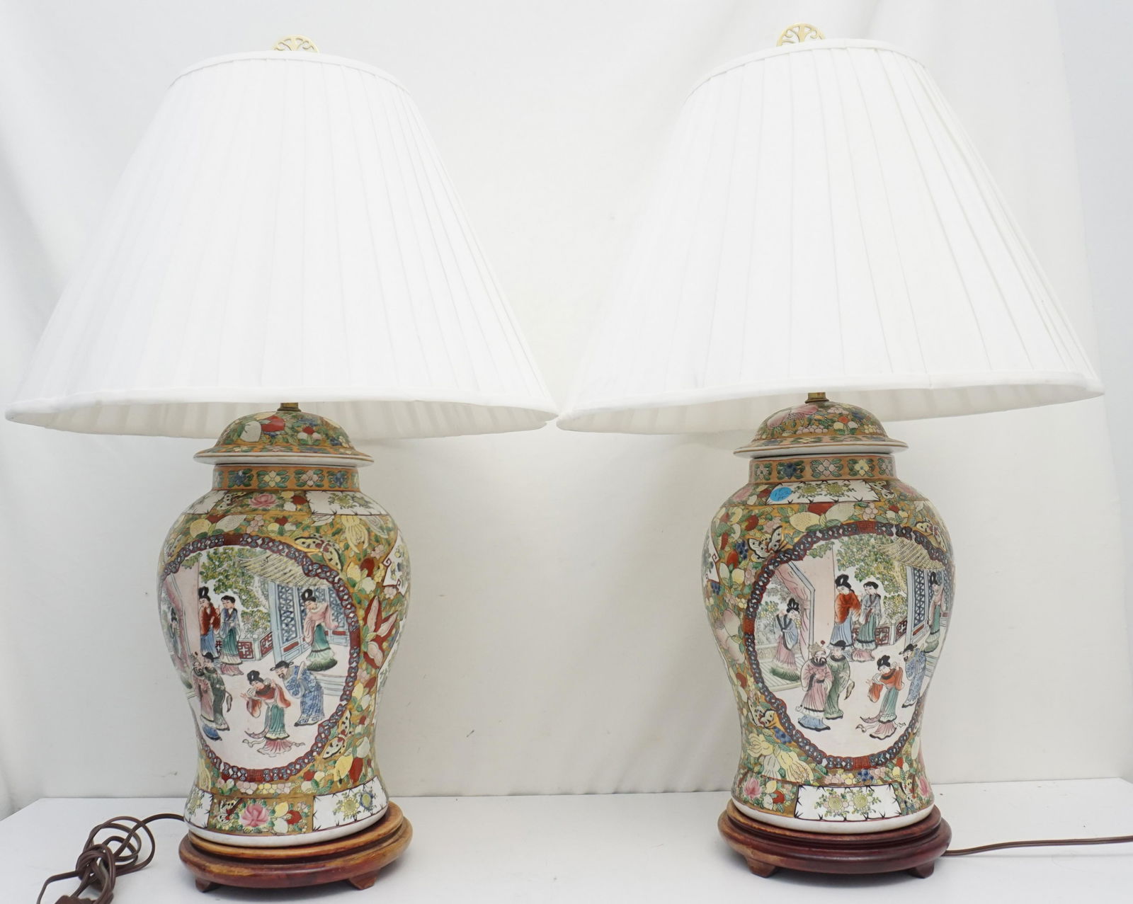 PAIR LARGE CHINESE REPUBLIC ROSE MANDARIN LAMPS: A pair of good Republic Period Chinese Export Porcelain LArge Rose Mandarin Jars, mounted as table lamps. Hand Painted polychrome enamel panels and gilt accents. Lamps 14" diameter and 20 1/2" tall wi