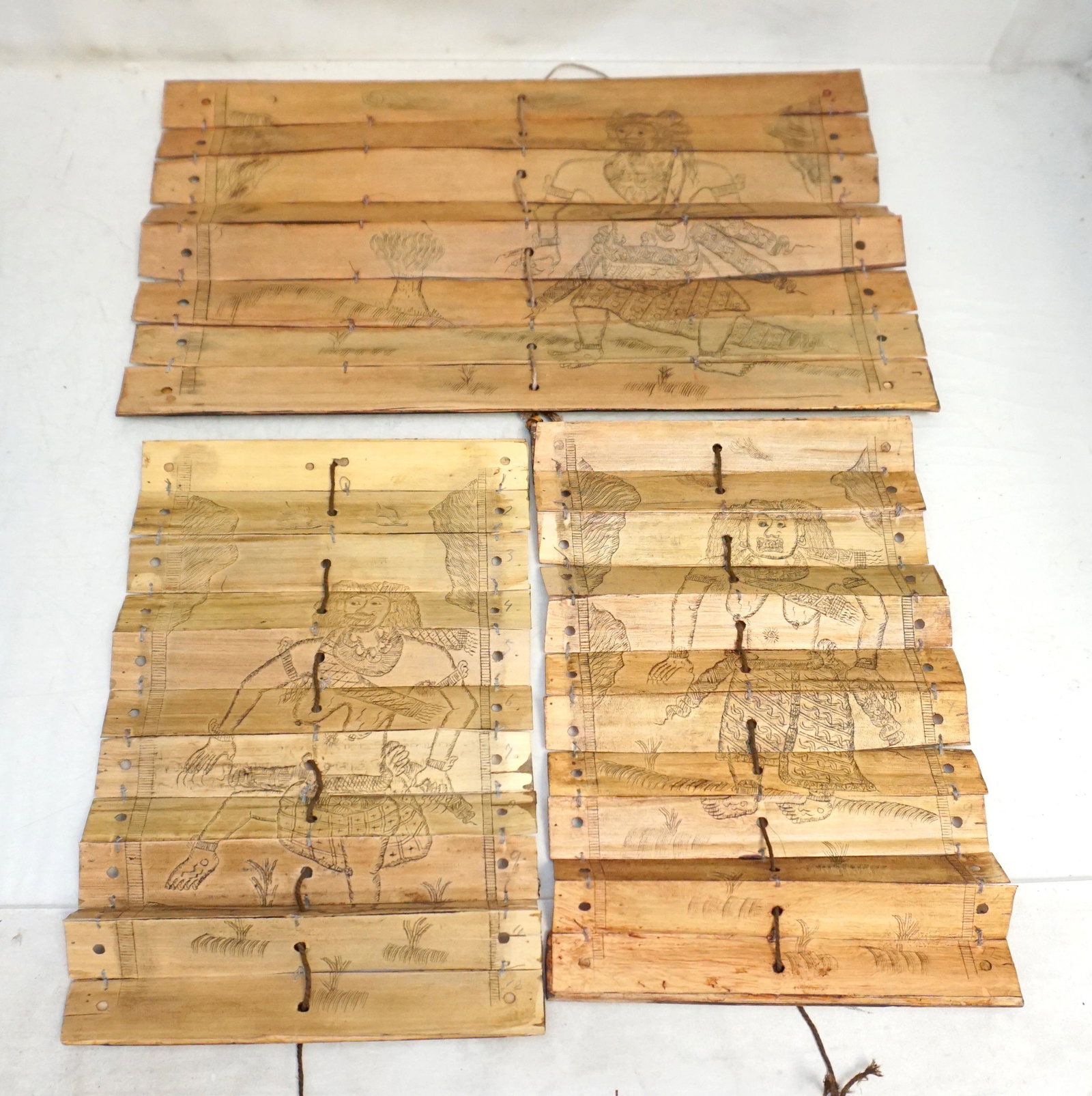 3 19th c BURMESE PALM LEAF MANUSCRIPT: 3 Antique 19th c. Balinese Palm Leaf Manuscripts with Etchings of Balinese Warriors on the reverse. Palm leaves were used as writing materials in Southeast Asia dating back to the 5th century. The man