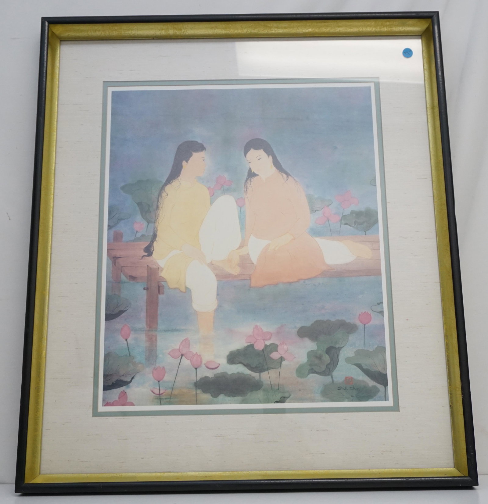 DINH THO VIETNAMESE 20TH CENTURY PRINT: Vietnamese French Dinh Tho (b. 1931-2011) Deux Femmes aux Nenuphars. A Vietnamese French print of a Dinh Tho watercolor painting Deux Femmes aux Nenuphars (Two Girls with Waterlilies), framed and sign