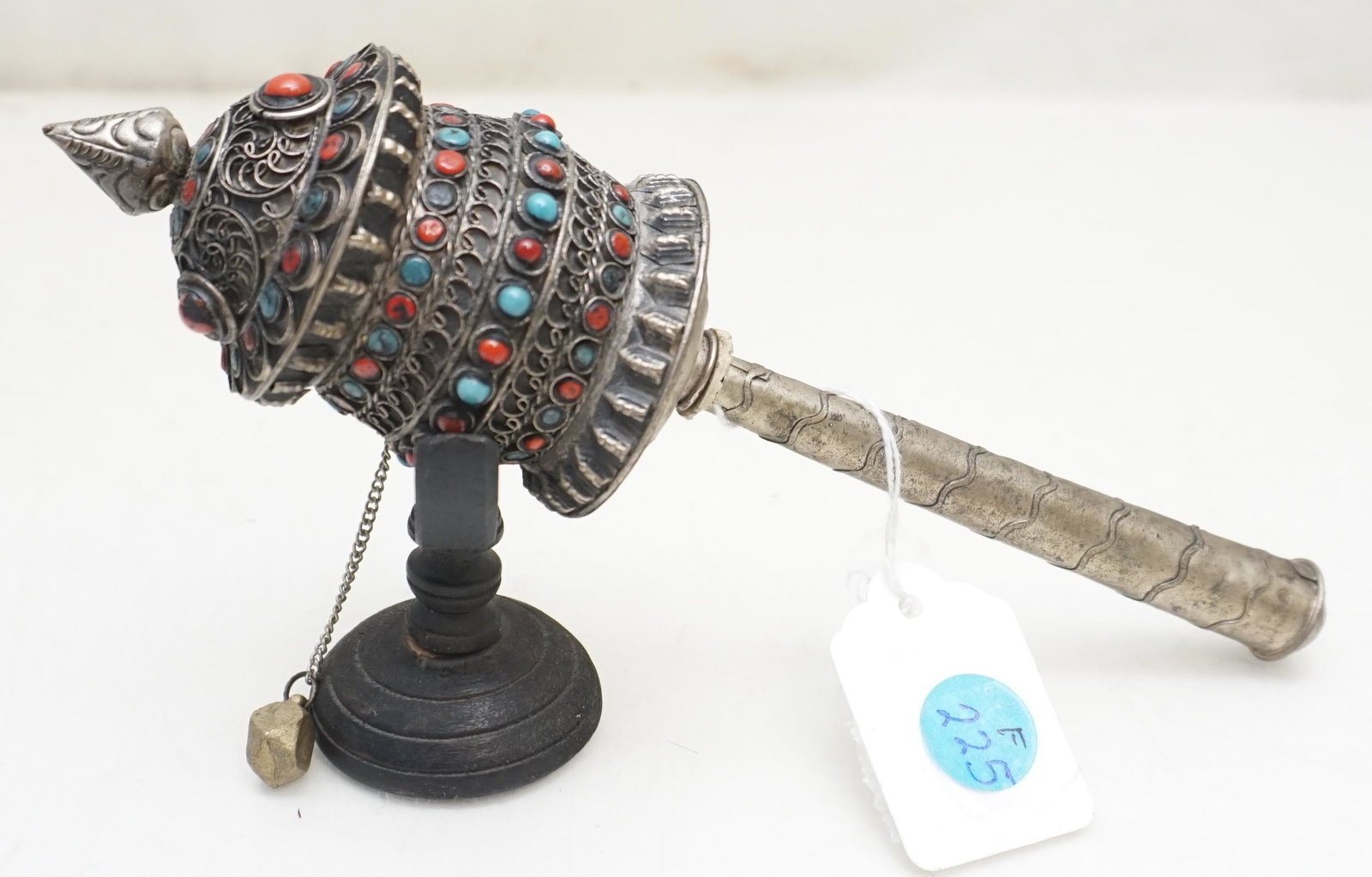 TIBETAN NEPALESE BUDDHIST PRAYER WHEEL: Tibetan prayer wheel with coral and turquoise cabochons set in a hammered copper head with mantra and stand. Called Mani wheels by the Tibetans, were used for spreading spiritual blessings and well be