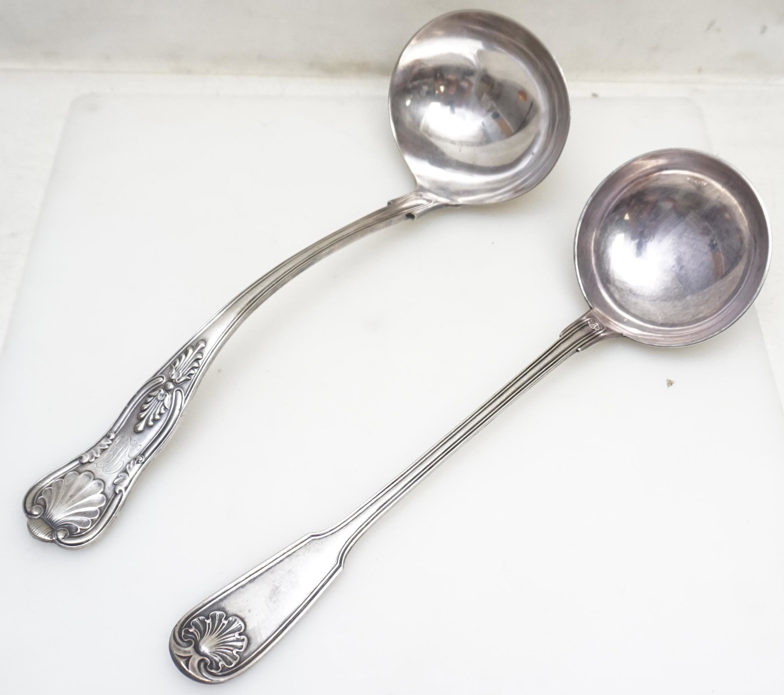 2 LARGE SILVERPLATE LADLES GORHAM & CHRISTOFLE: 2 Large Antique/Vintage Silverplate Punch / Soup Ladles. 1- Gorham Kings Pattern Punch Ladle, monogrammed 13". 2- Christofle Soup Ladle 12 1/2". Weight 1 pd. PROVENANCE: A Private Charleston SC Estate
