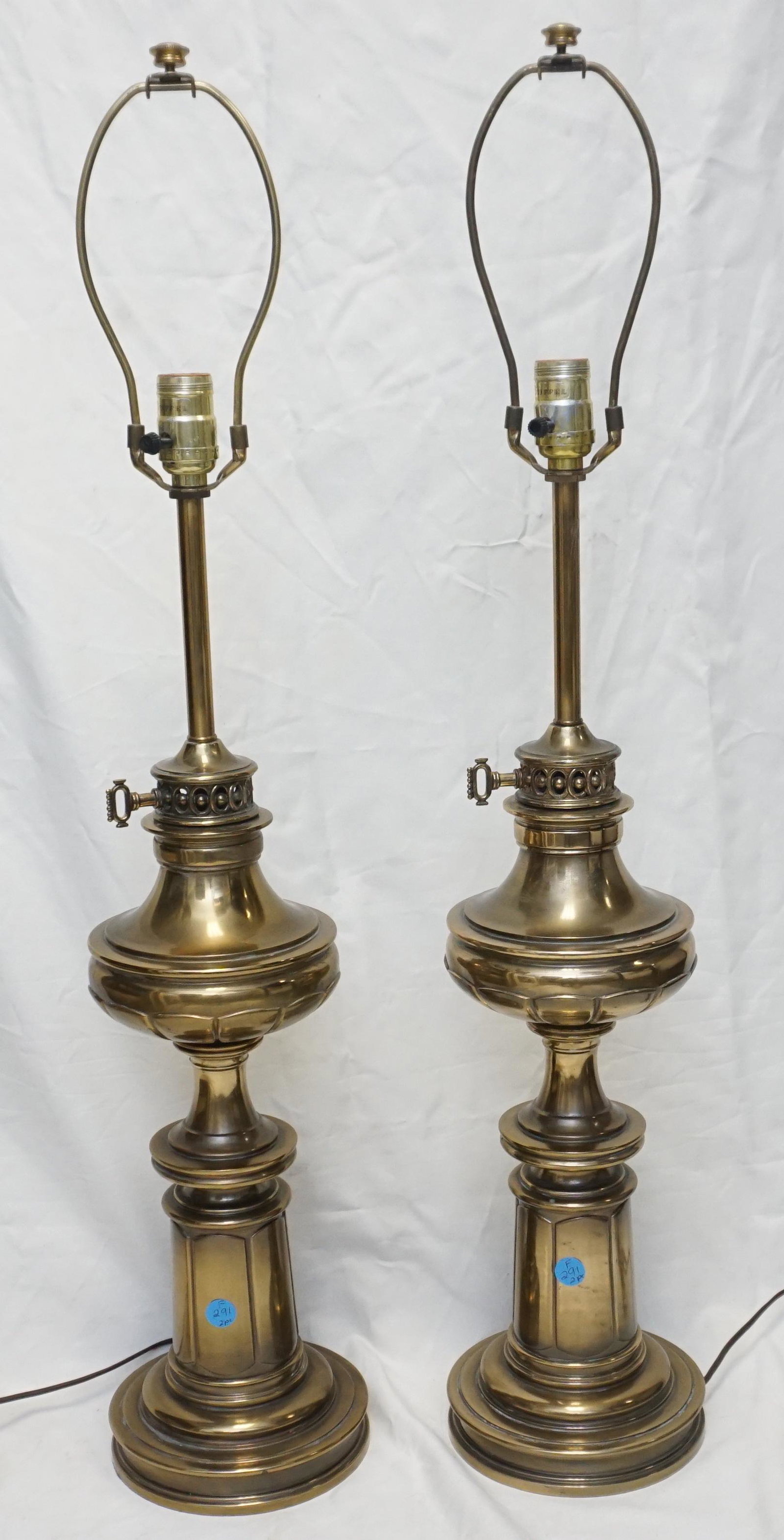 PAIR VINTAGE TALL STIFFEL BRASS LAMPS: Pair of Vintage Mid Century Tall Stiffel Brass Lamps. Each 27" without shades or harp. 34" to top of harp. Weight combined 21 pds. . * NO IN HOUSE SHIPPING. PROVENANCE: A Private Charleston SC Estate.