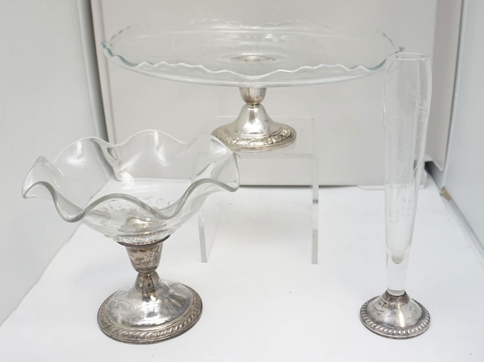 3 AMERICAN STERLING SILVER CRYSTAL - CAKE PLATE - BOWL: All are Vintage and Weighted.1- Vintage Sterling Silver Footed Cake Plate by Alvin 12"x12"x4". 2- Vintage Sterling Silver Footed Compote, 7"x7"x6". Vintage Sterling Silver Footed Etched Bud Vase by Du